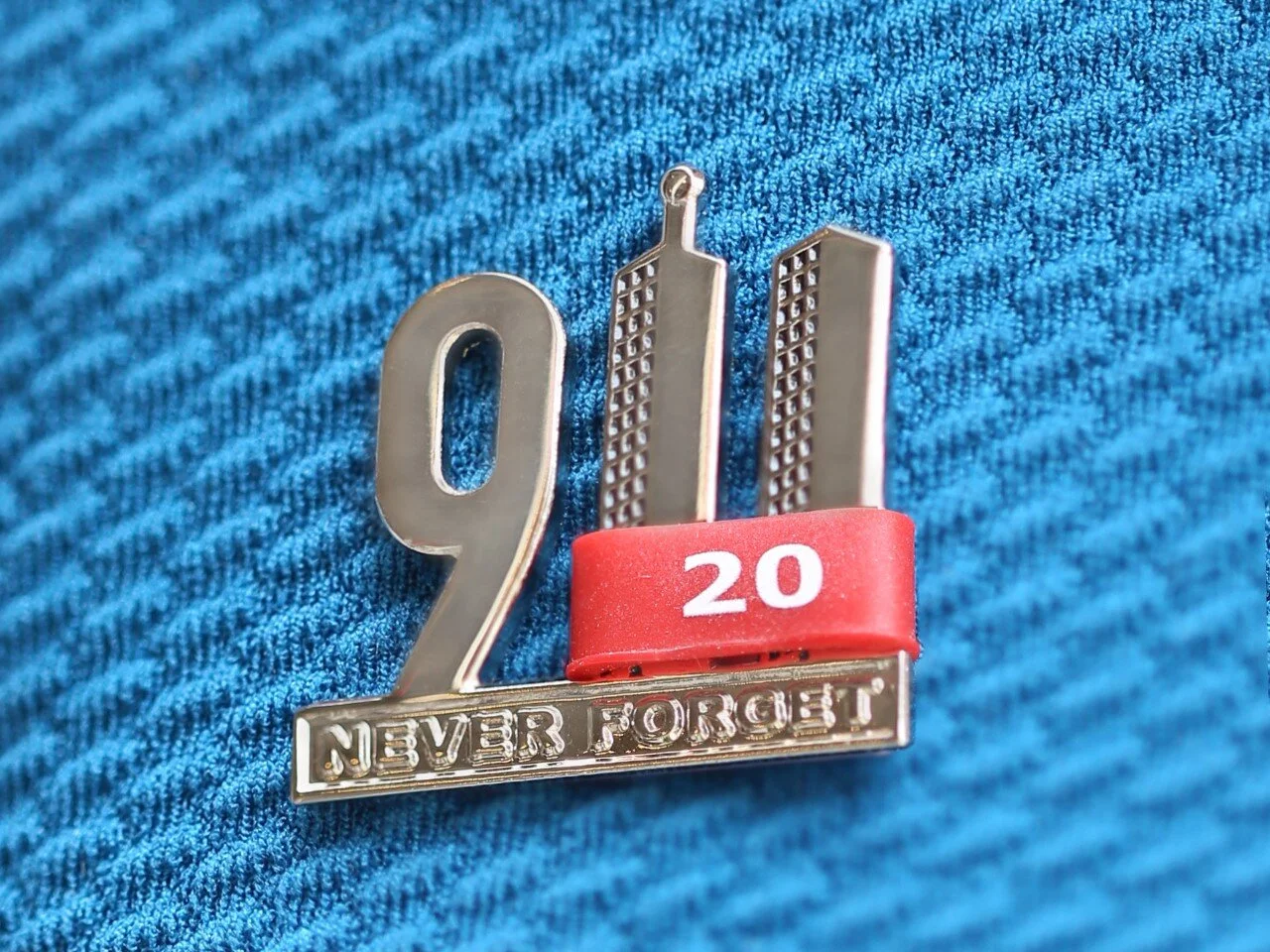 Steven Singer Jewelers Debuts 20th Anniversary 9-11 Never Forget Pin and Fundraiser