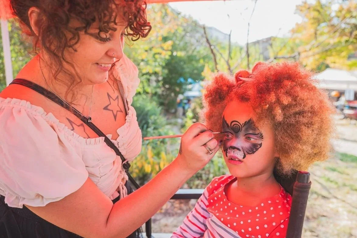 Child getting face painted at Northern Liberties Spring Fest