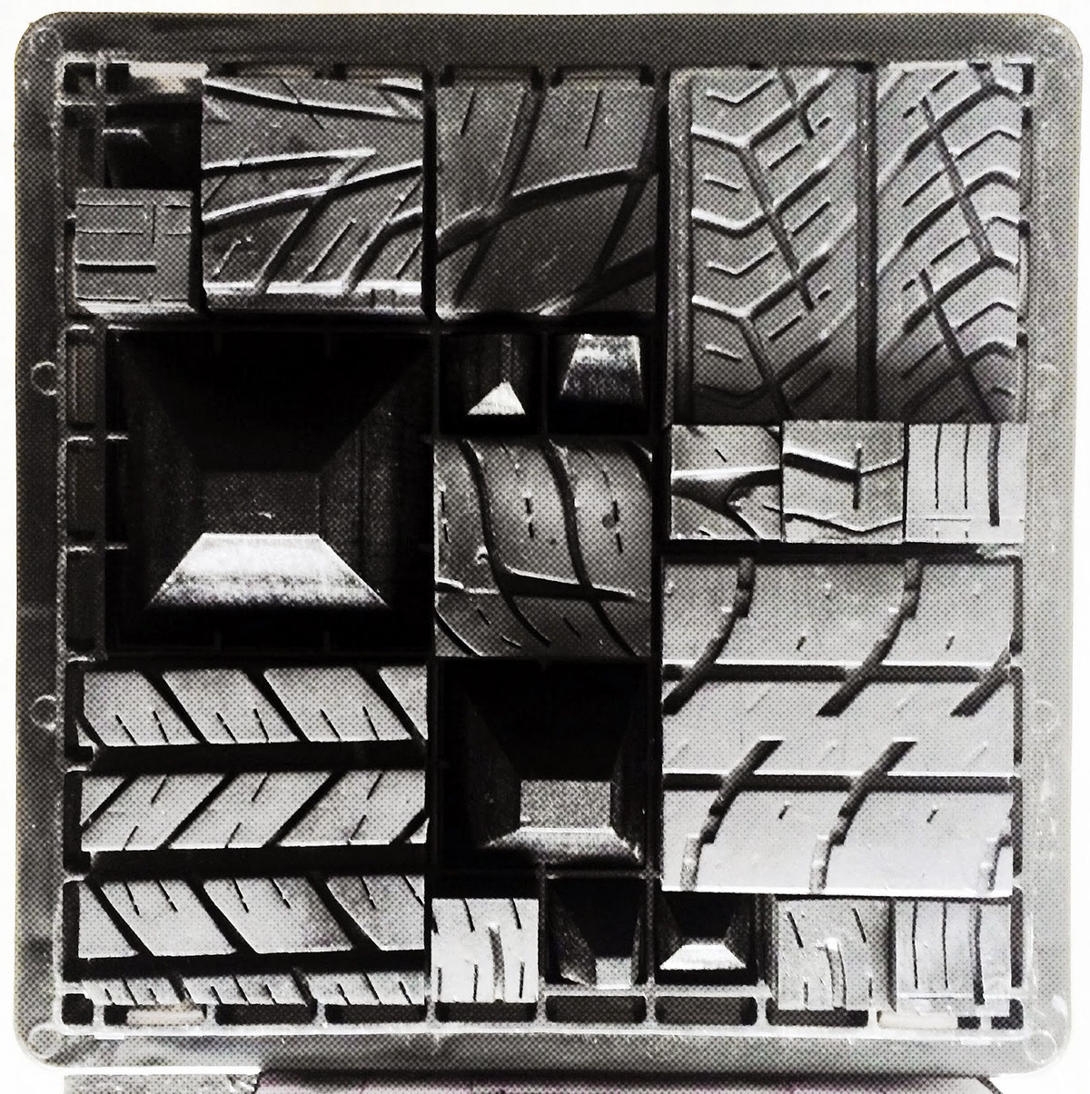 Upcycled car tire patterns represent the embedded post carbon materials that are the building blocks of the new city.