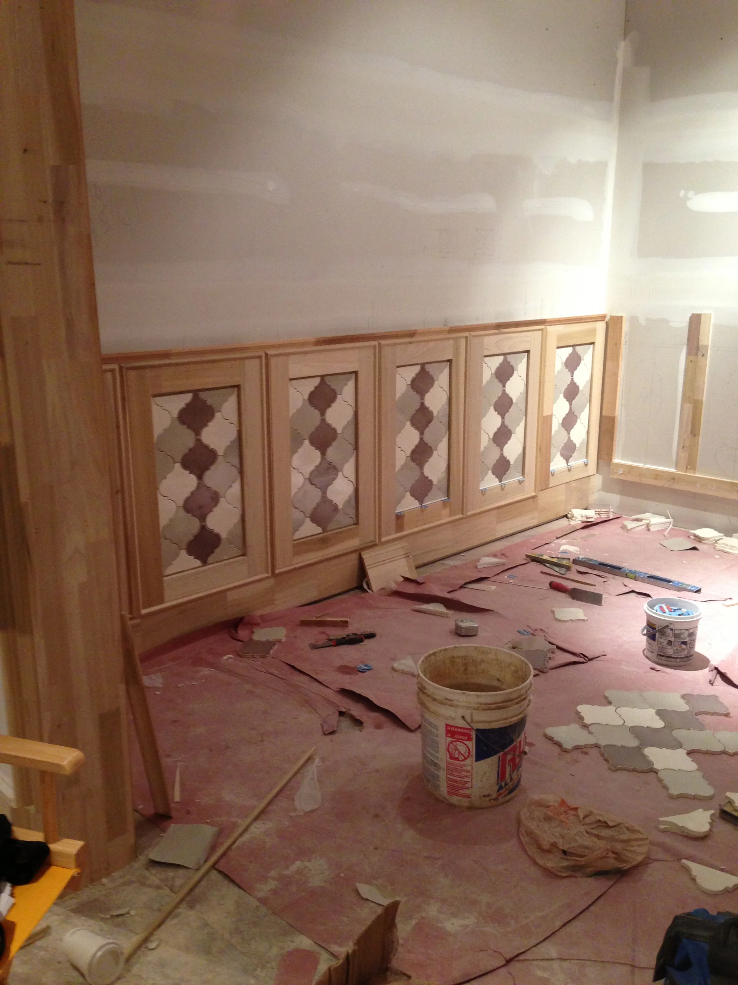 Espresso Room - In Process. Building the wainscot with a tile insert and a detailed trim design. 