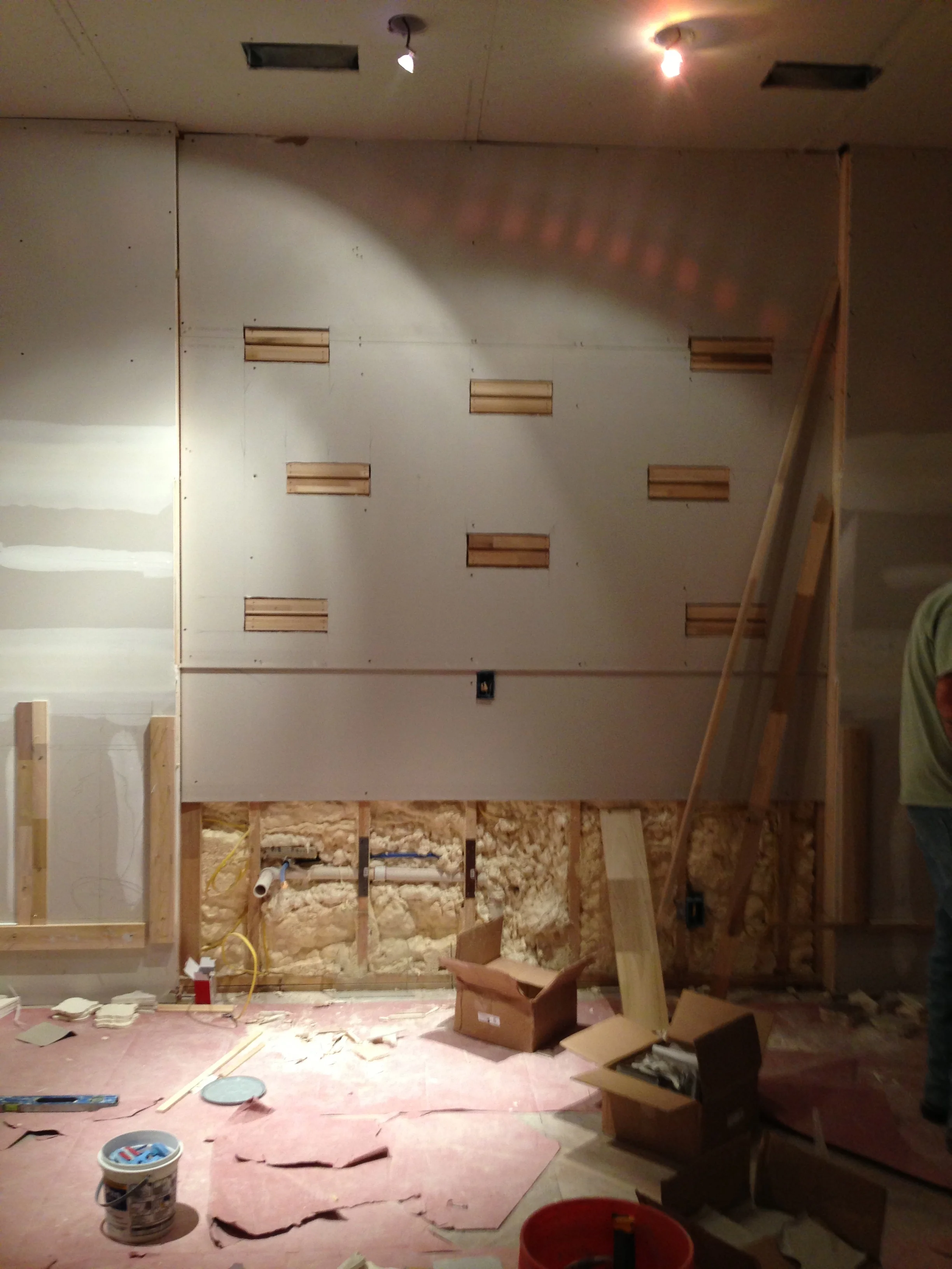 Espresso Room - In Process. The front wall where the cabinet will be located. Above the cabinet is the framework created to hold floating glass shelves. The walls on each side of the cabinet were brought out 4" and will hold the cylinder coffee bean silos. 