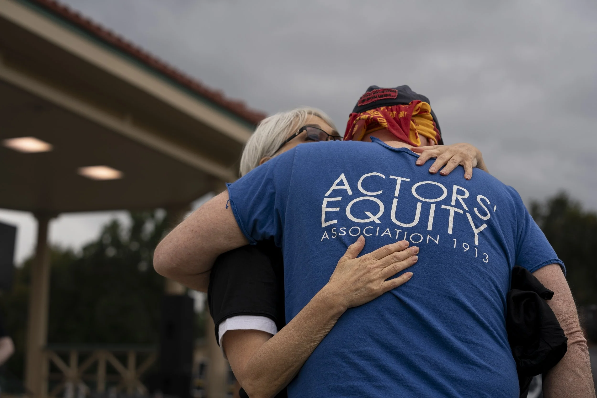 230825_SAG-AFTRA Solidarity Rally_Sheila Hugging Equity member.jpg