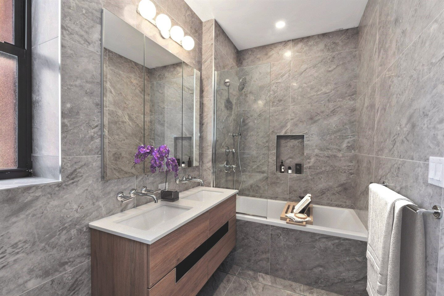 A classic new bathroom, recently built for one of our luxury rentals buildings.