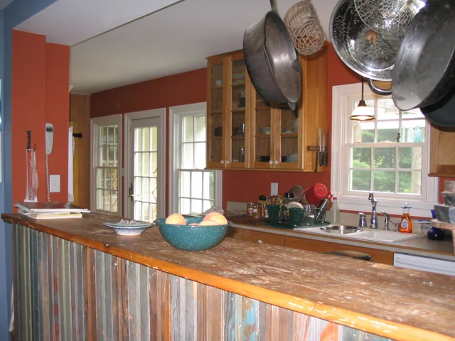 After: even though this kitchen is narrow it's very functional, even for a two-cook household that regularly throws large parties.
