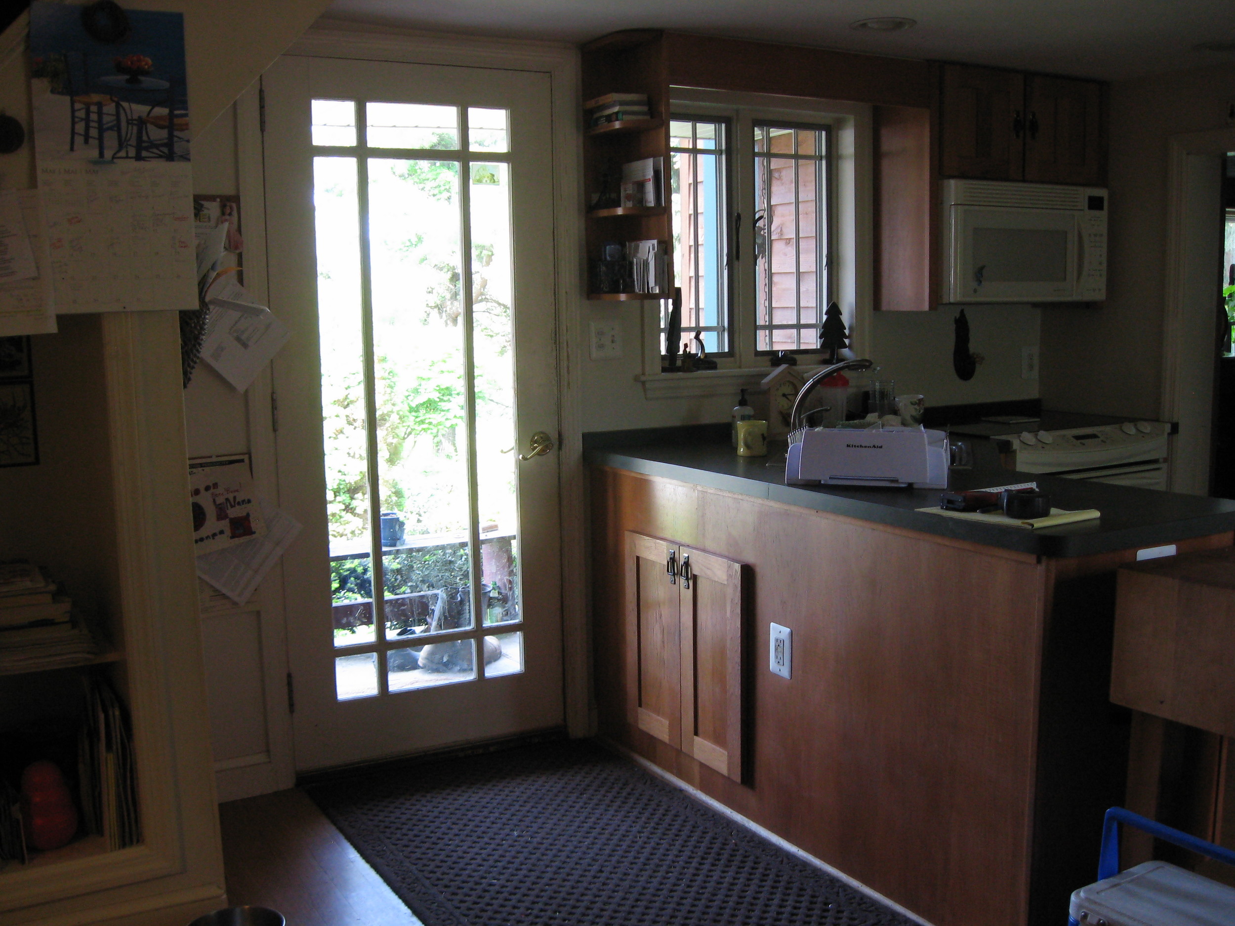  Before:Just not enough space or natural light in this tiny kitchen!  