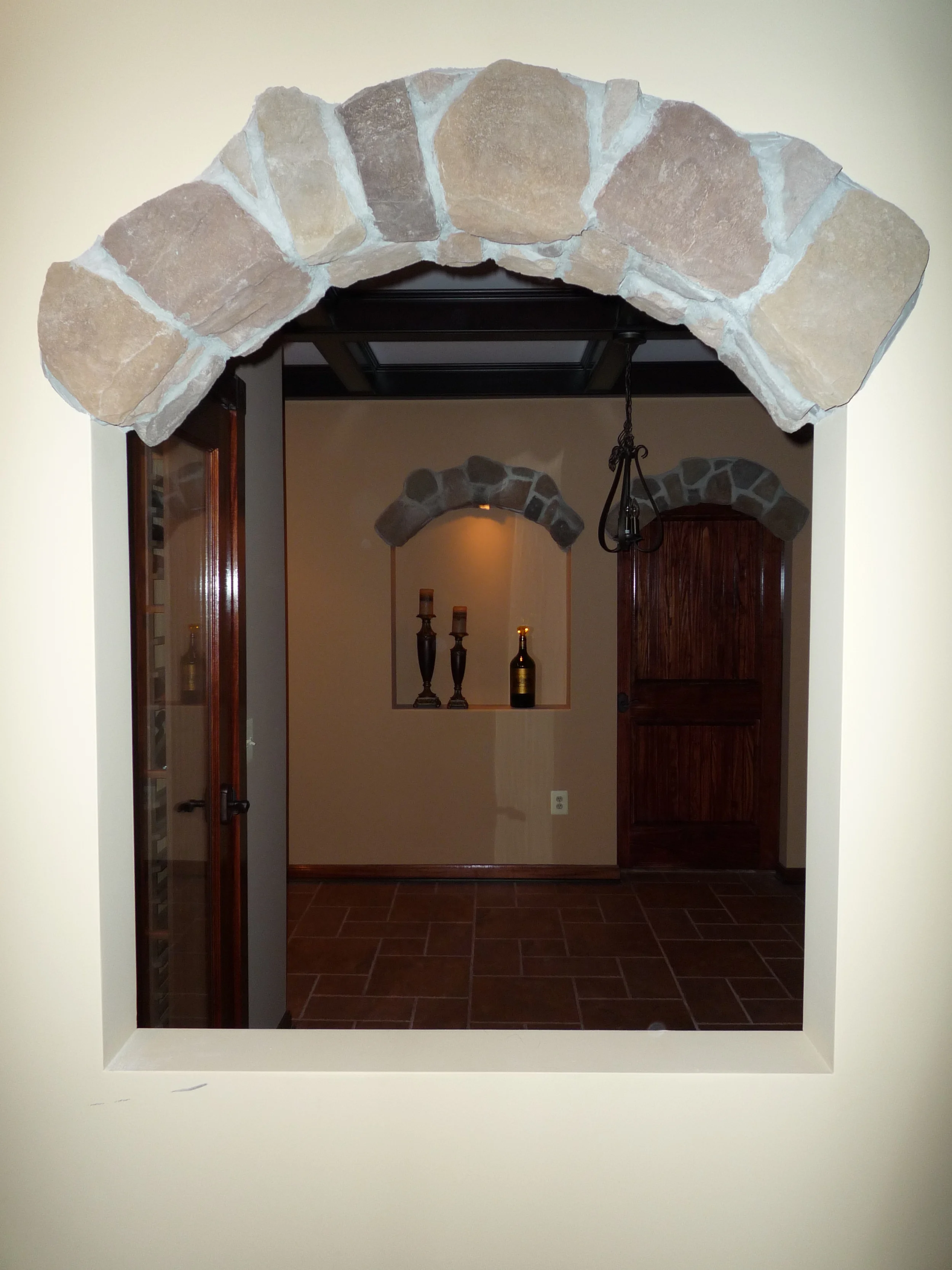   A wine tasting room between these arches is what makes this basement so special.  