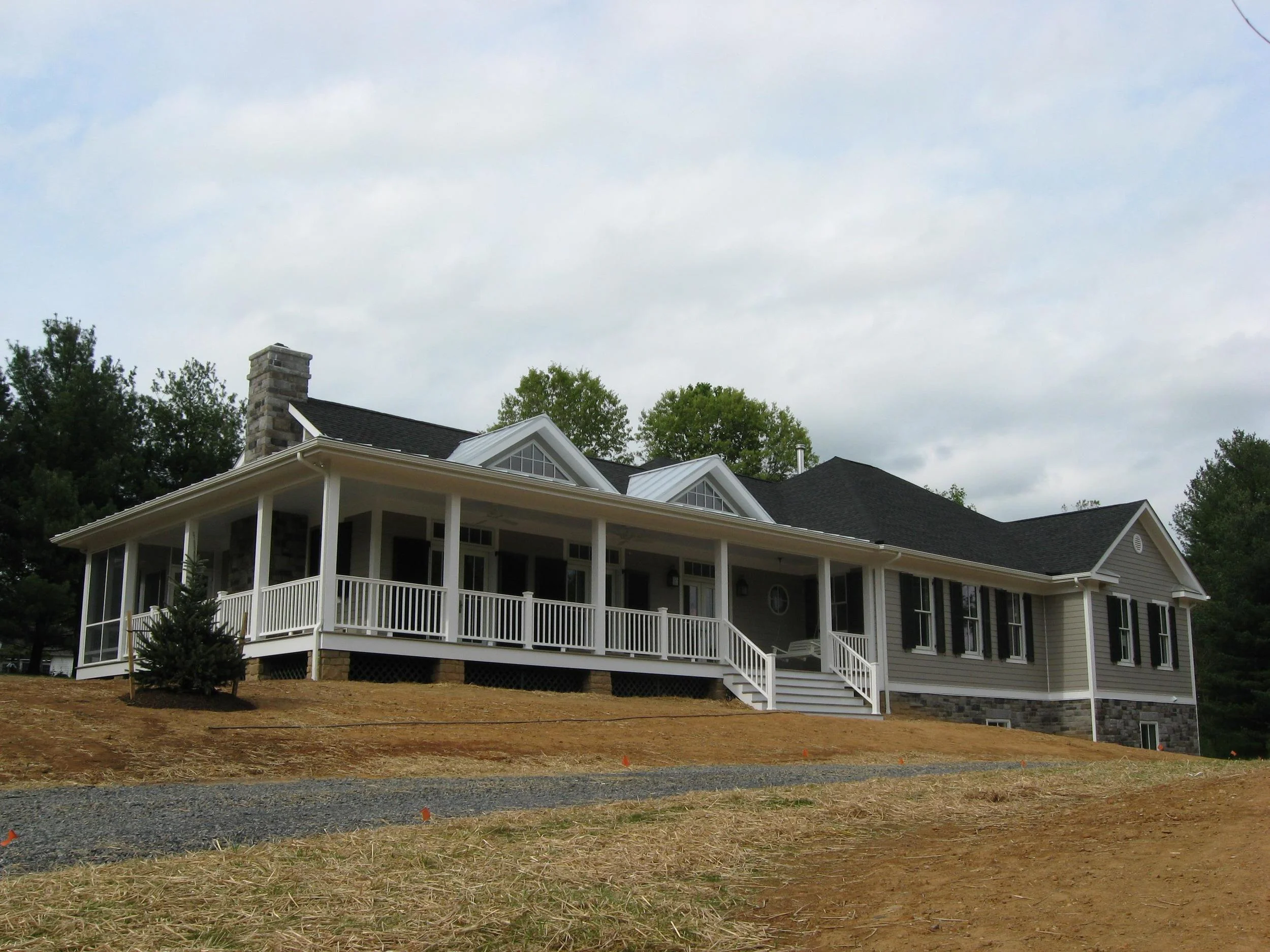   This home was designed to accommodate a two-dog family, complete with a doggie deck, dog "house" in the corner of the garage, and human/dog zones!   