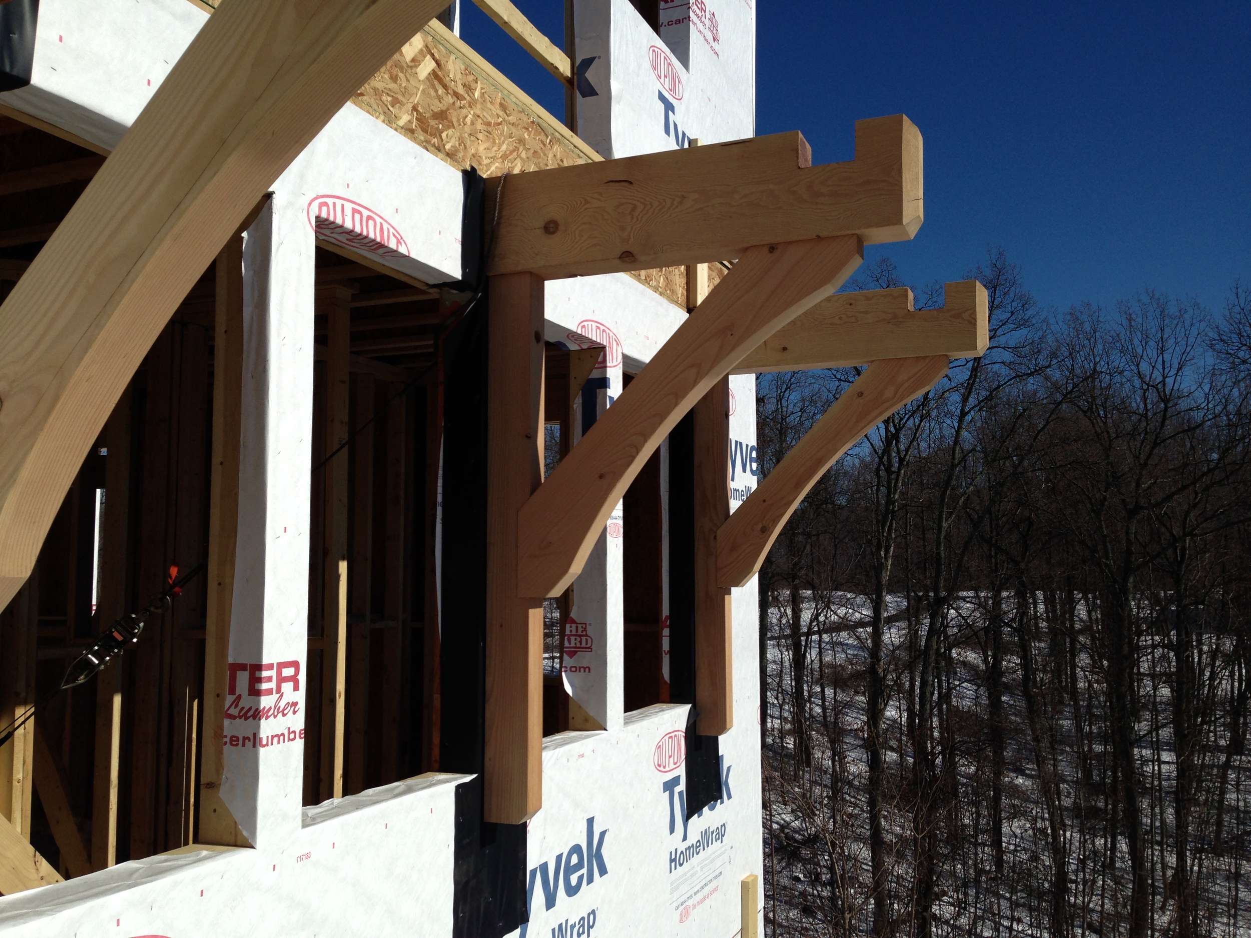  Check out these timber brackets, assembled by the builder in his shop per structural engineer Alicia McCormick's specifications to me.&nbsp; Detailed drawings of these brackets and their connections to the wall were critical. 