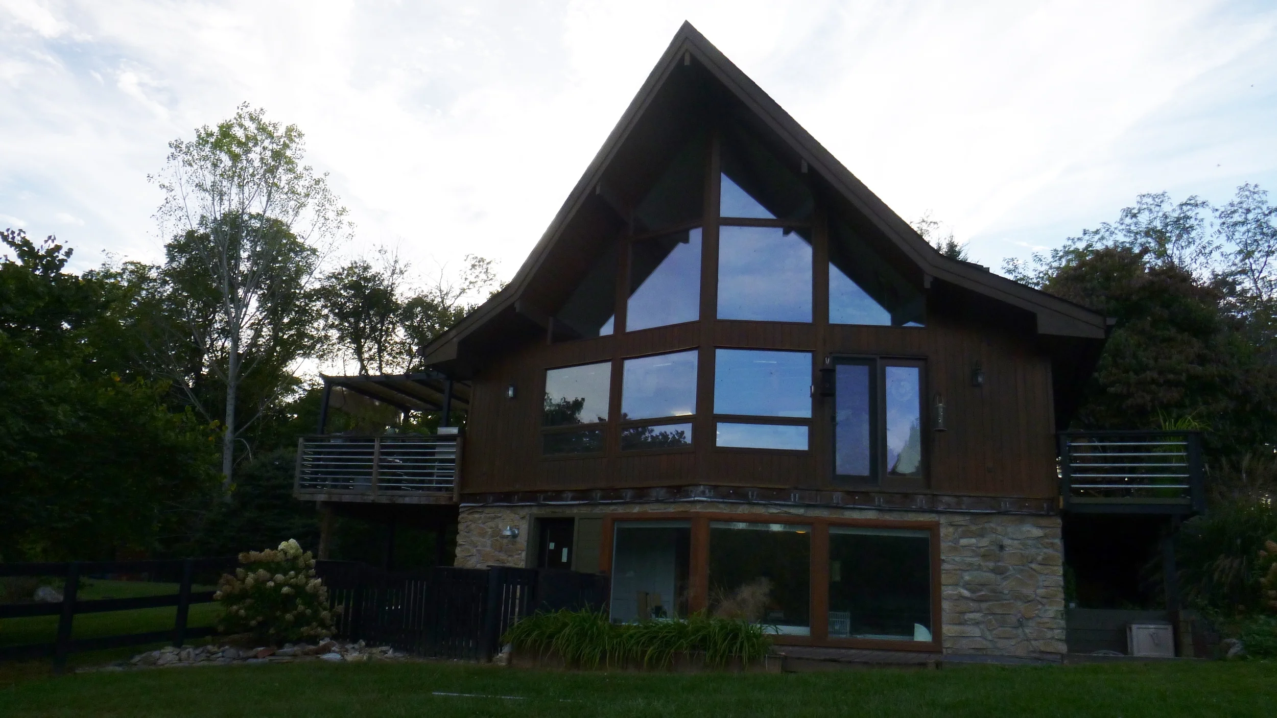 Contemporary additions to postandbeam prow home — Fine Line Home