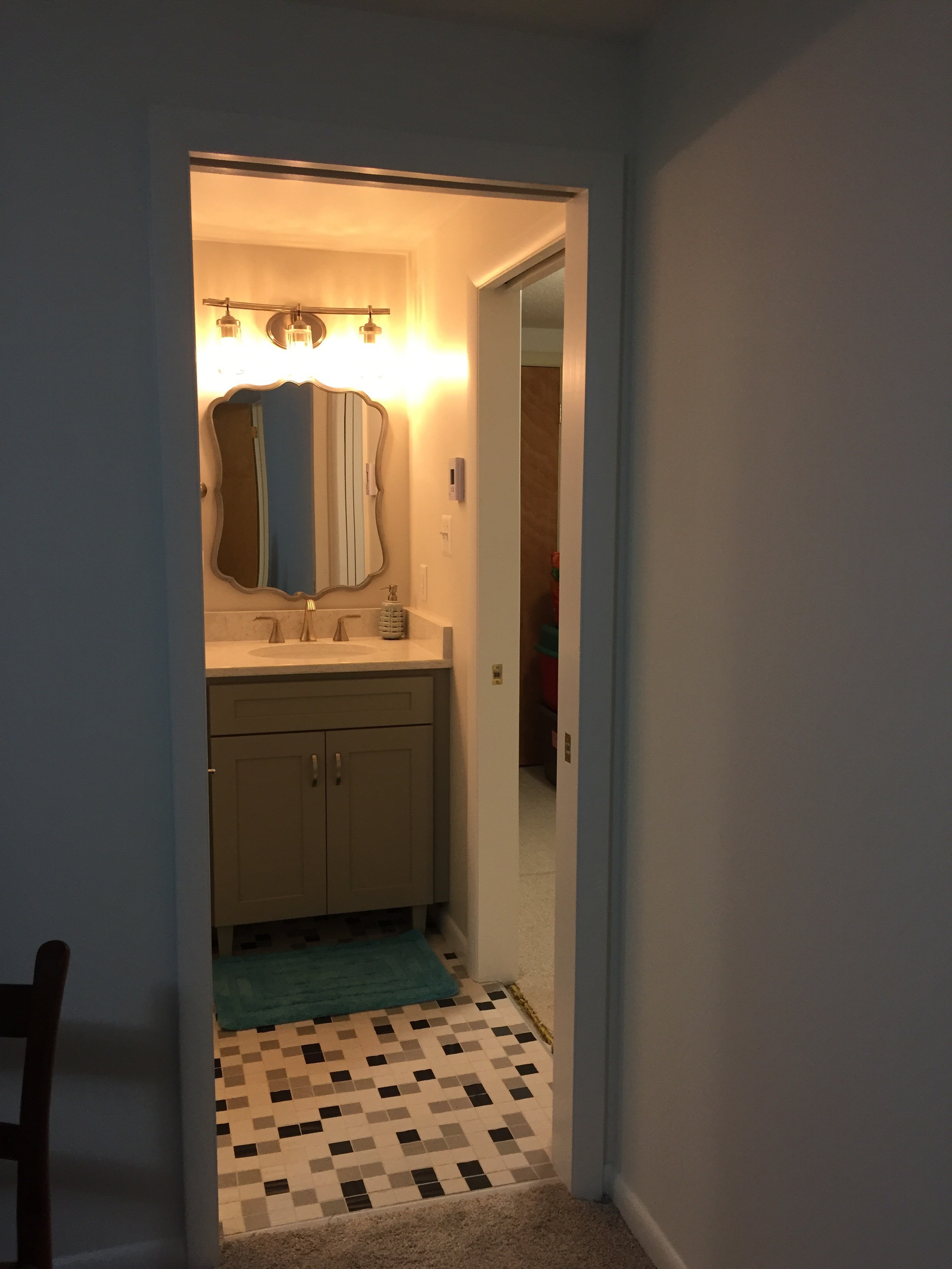  After, a new door into one of the bedrooms provides direct access to the vanity area. 