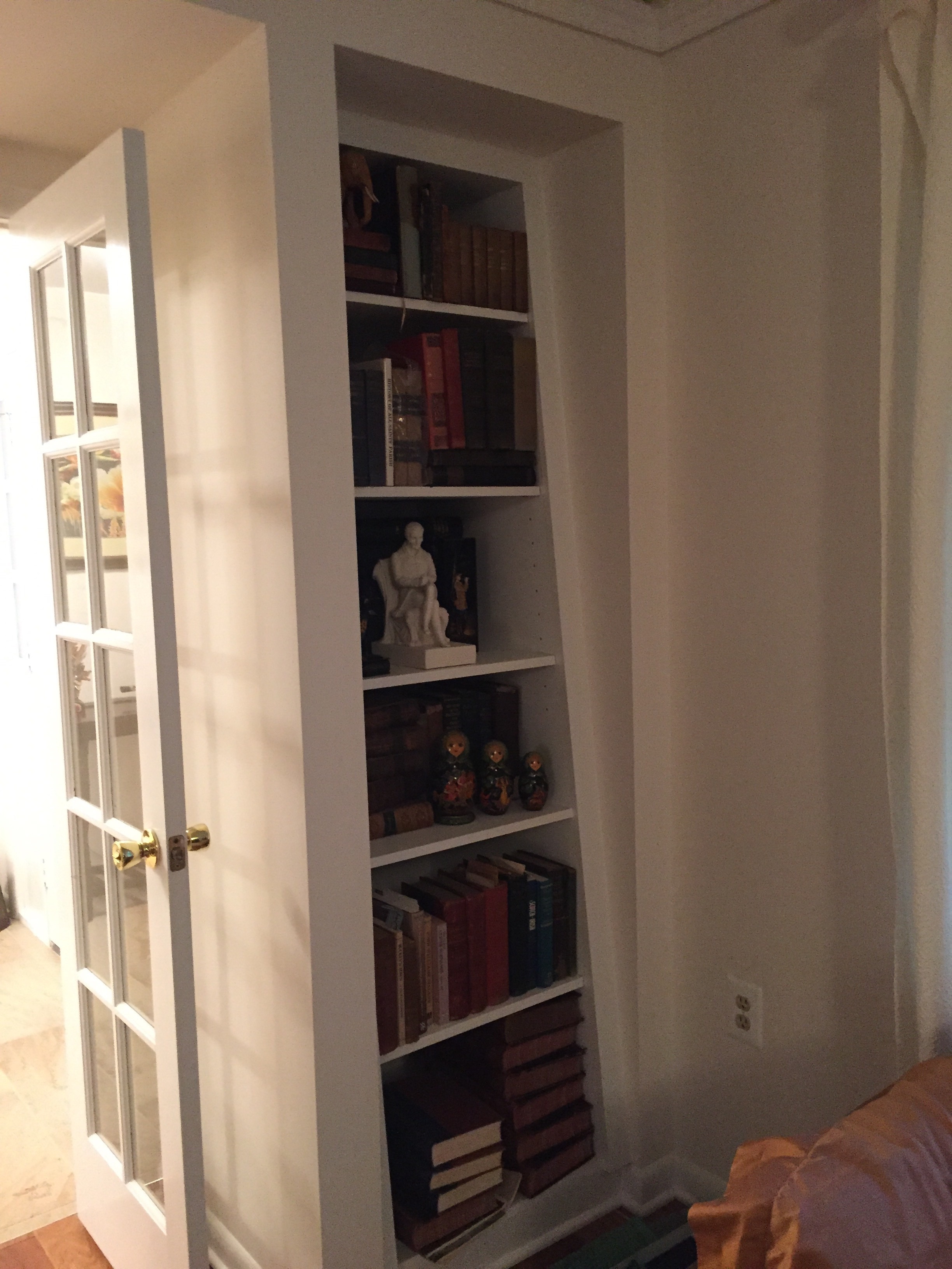  After:&nbsp; the French doors have been reversed so they don't swing into the Foyer anymore.&nbsp; A new bookcase in the corner of the Family Room provides a nice wall perpendicular to one door; a new coat closet (not shown here) in the left corner 