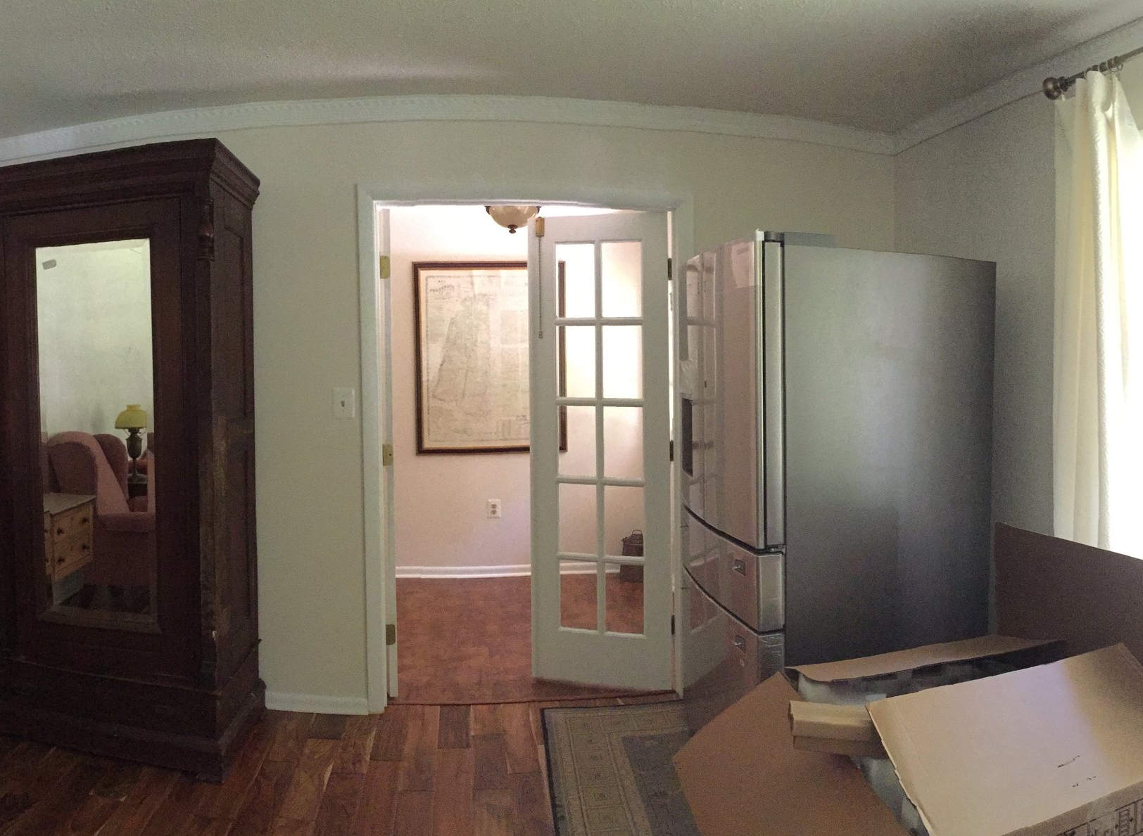  Before, the Family Room doors leading into the Foyer beyond swung into the foyer. 