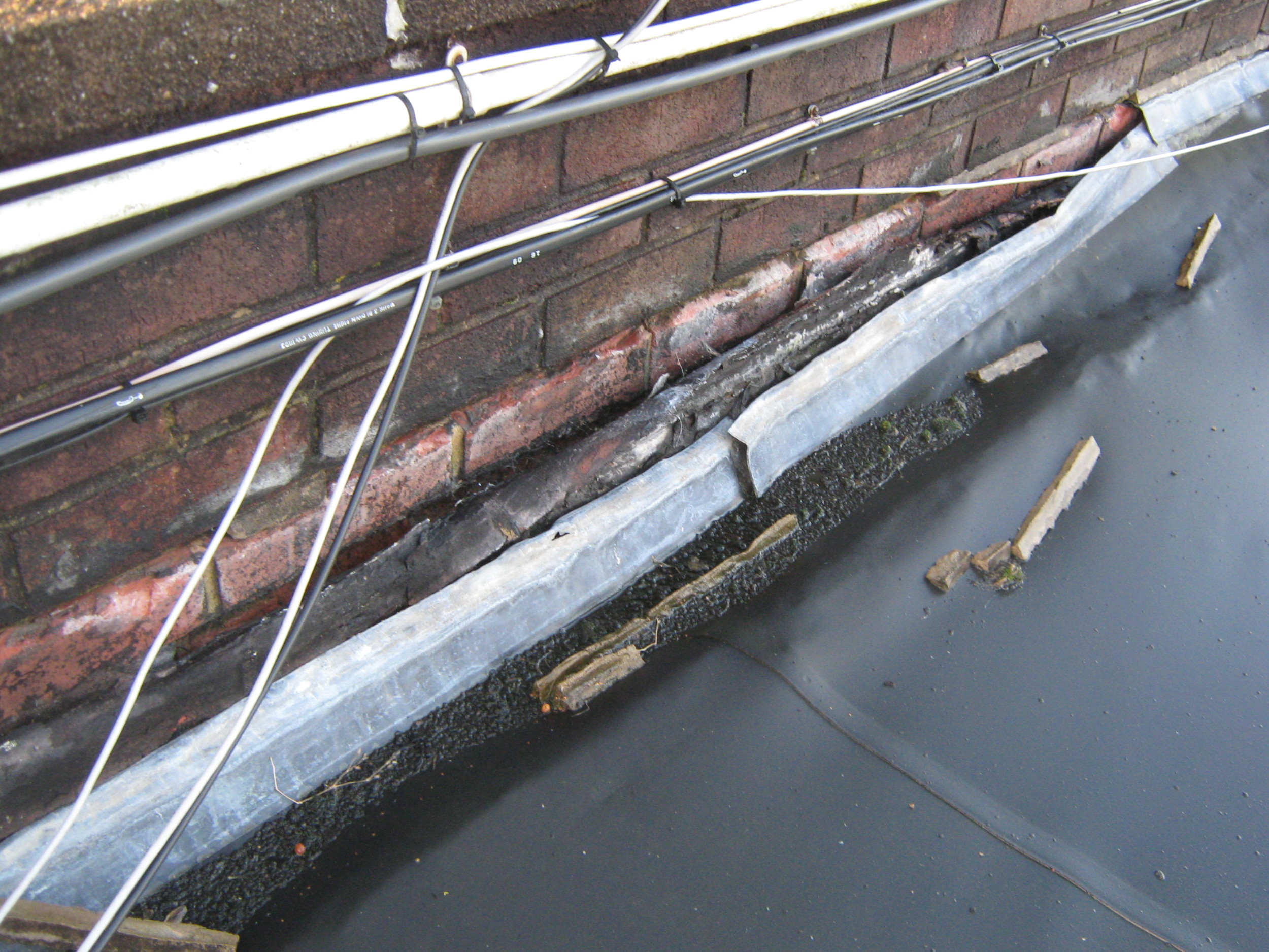  Flat roof water damage 