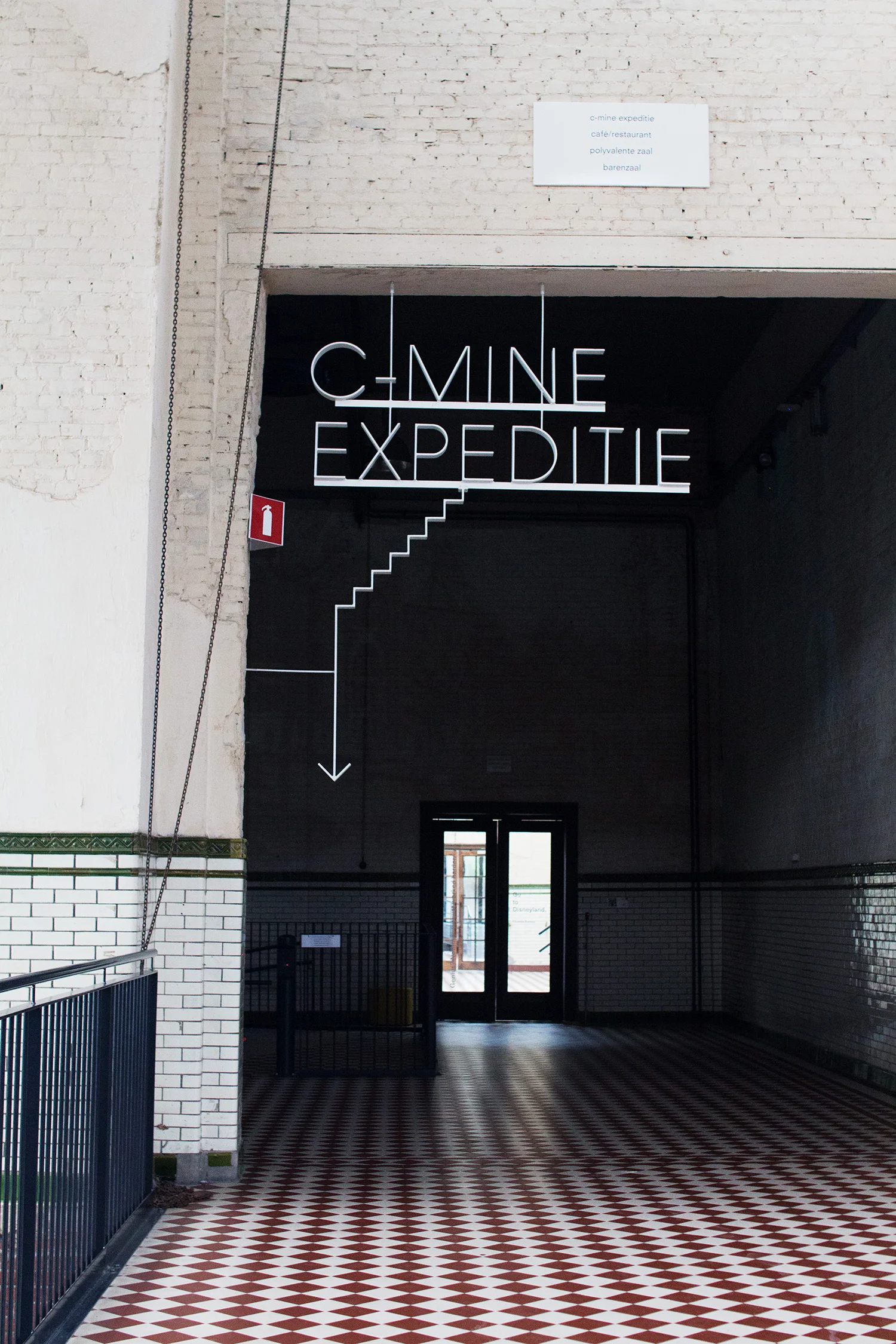 C-mine expeditie sign in dark corridor, Genk