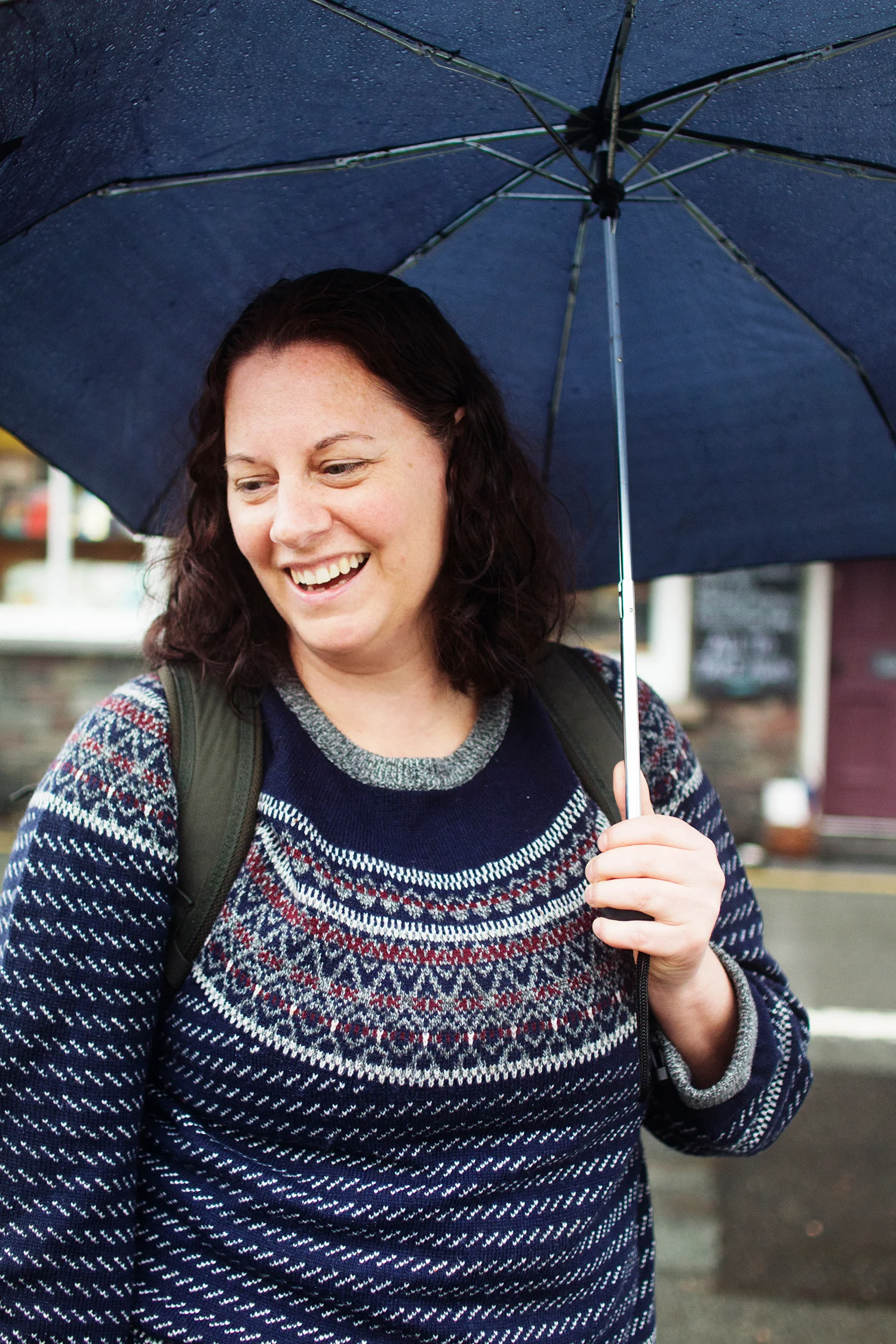 Woman holding an umbrella in the rain