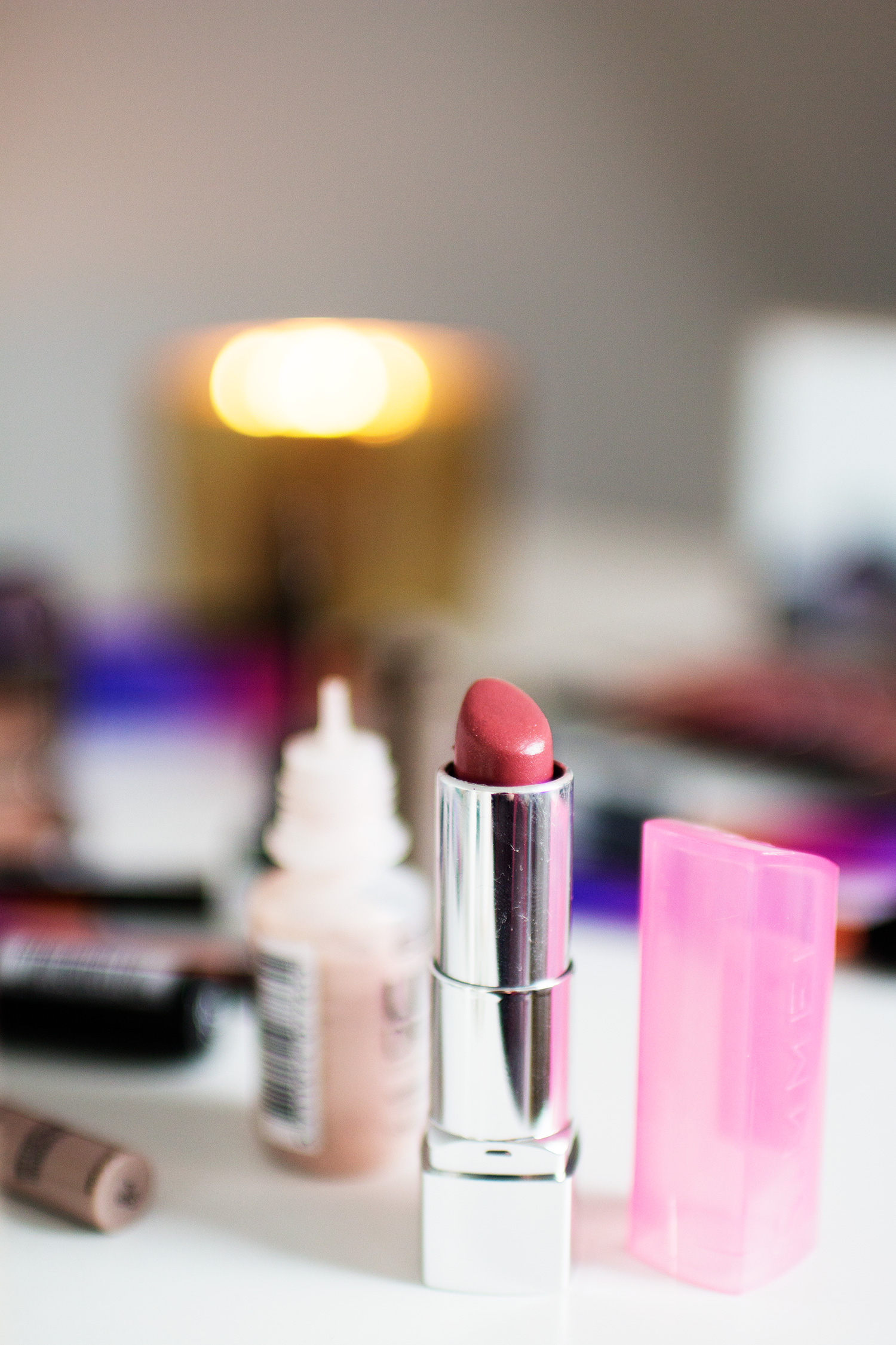 Rimmel Moisture Renew Sheer &amp; Shine Lipstick in Good Mauve. Photography by Alice Red.