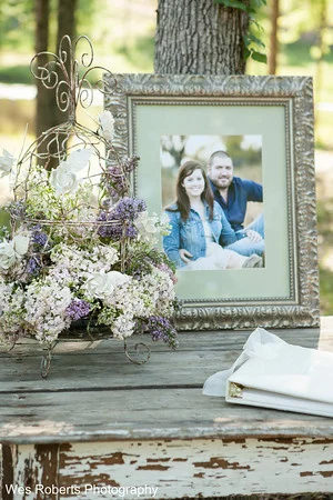 Guests first glance at gorgeous blooms was this lilac filled birdcage at the sign in table.