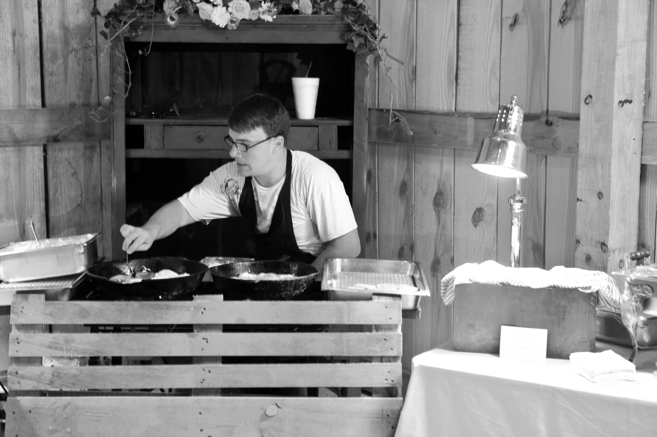 My brother, Bert frying cornbread and green tomatoes. Hey Bert, where is your bow tie?