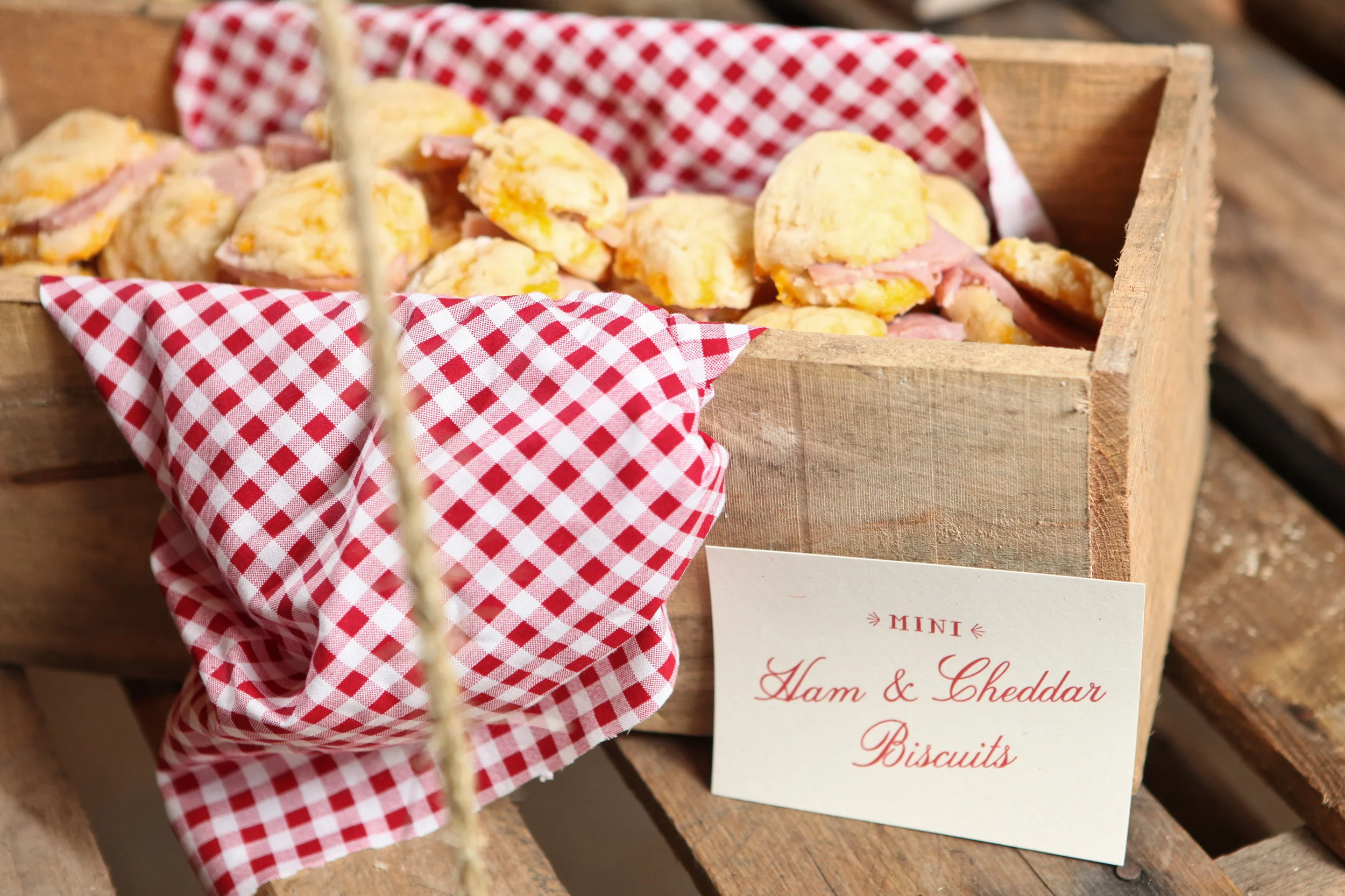Lined with gingham napkin and stuffed with homemade biscuits.