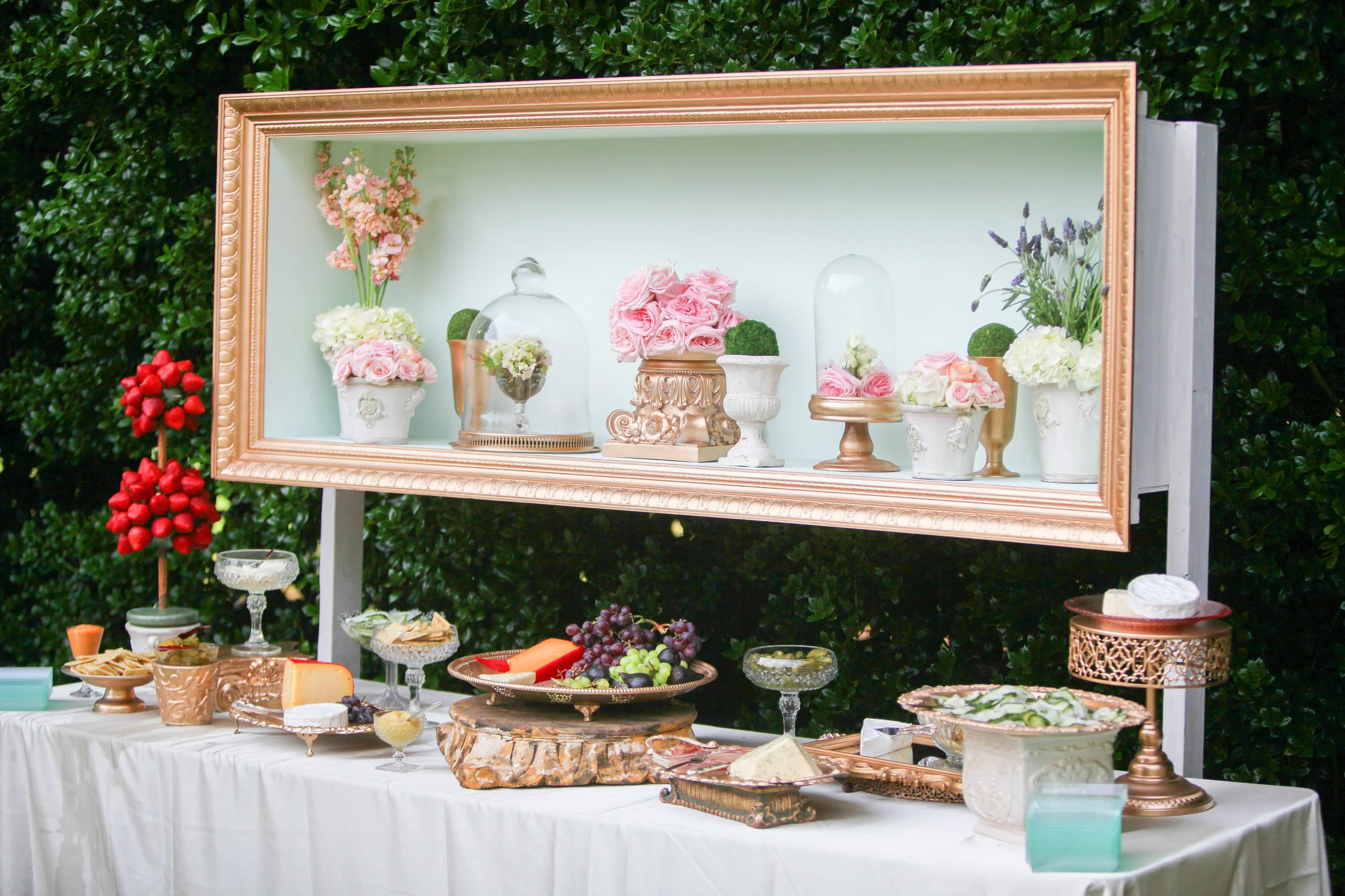 Fruit, cheeses, homemade pickles, seasoned crackers (Jeremy's favorite), and more looked great under served under these custom boxes made by my hubby! I'm obsessed with the gold molding.