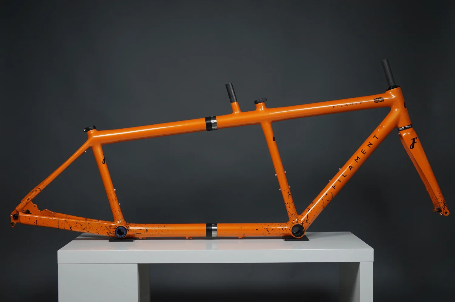 Filament Bikes custom carbon road tandem with splitters to make it easier to transport your bike.