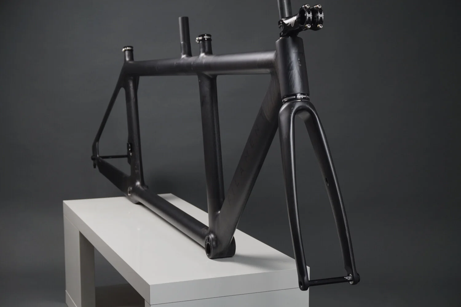Custom carbon aero tandem bicycle for a triathlon team.