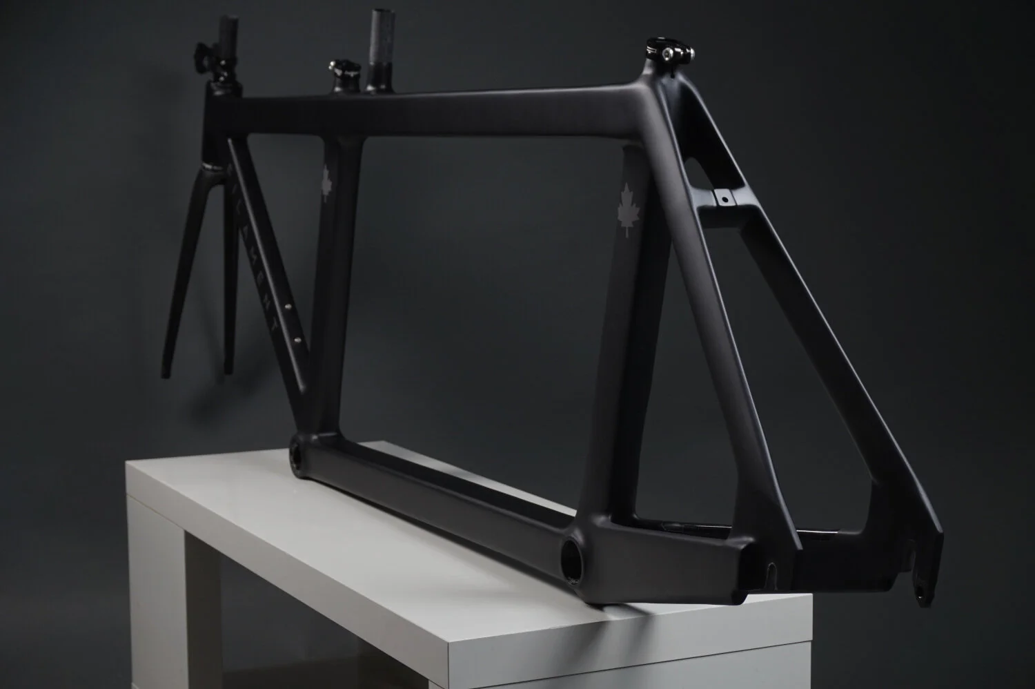 Rear view of Filament's matte black aero triathlon frame made in the UK.