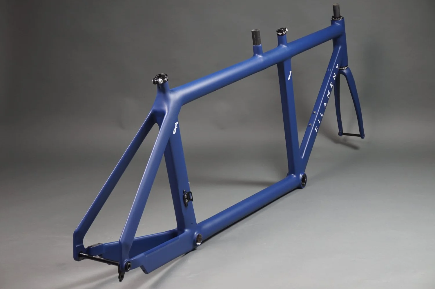 Custom carbon fibre tandem triathlon bike frame. Made in the UK by Filament Bikes.