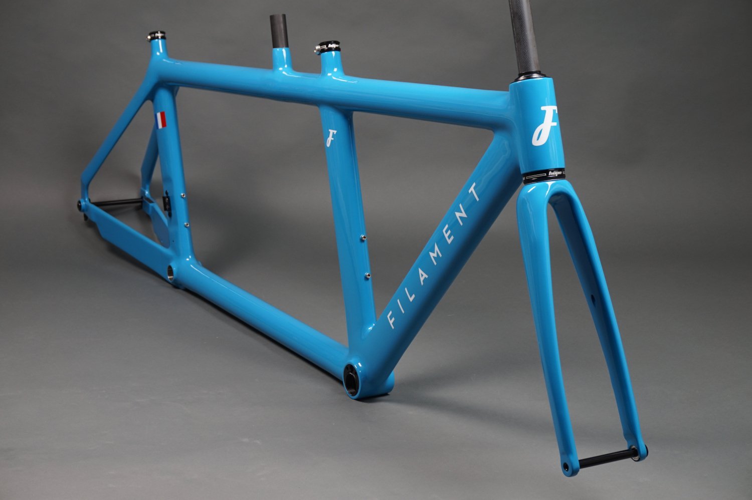 Disc brake triathlon tandem bike frame with custom geometry.