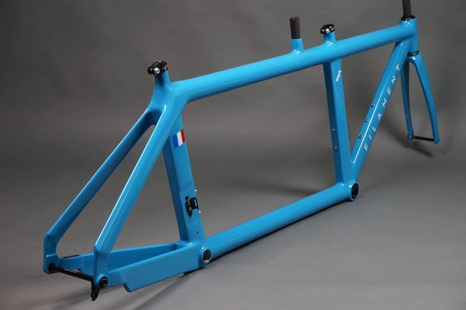 Custom carbon fibre tandem triathlon bike frame. Made in the UK by Filament Bikes.