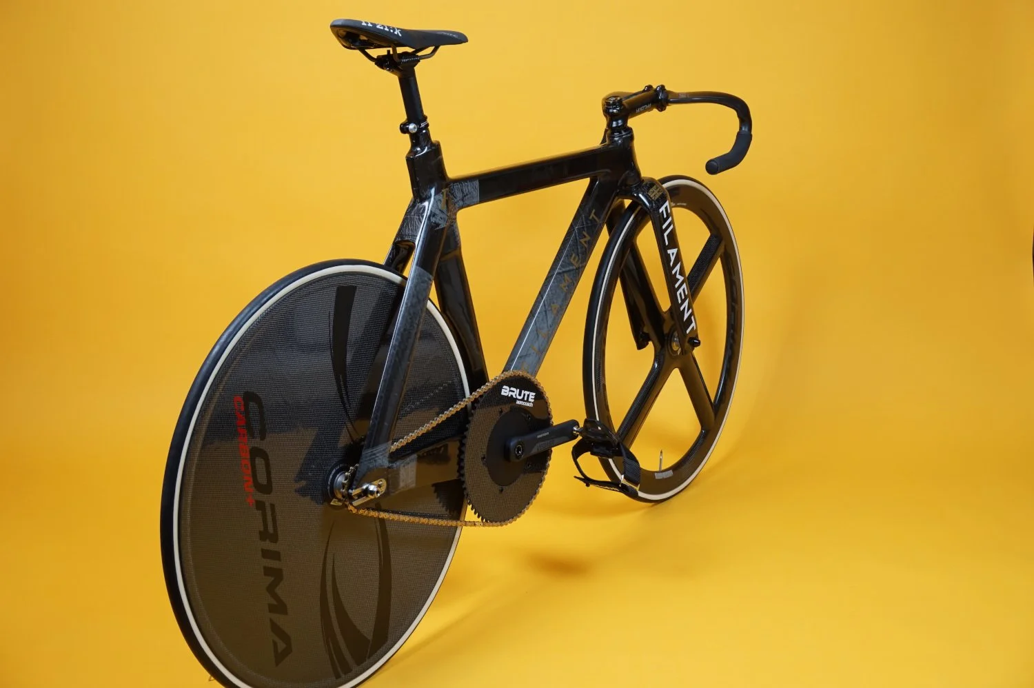 Carbon fibre track bike frame made in the UK. Assembled with AeroCoach chain ring and Corima front 4 spoke wheel and Corima rear disc wheel..