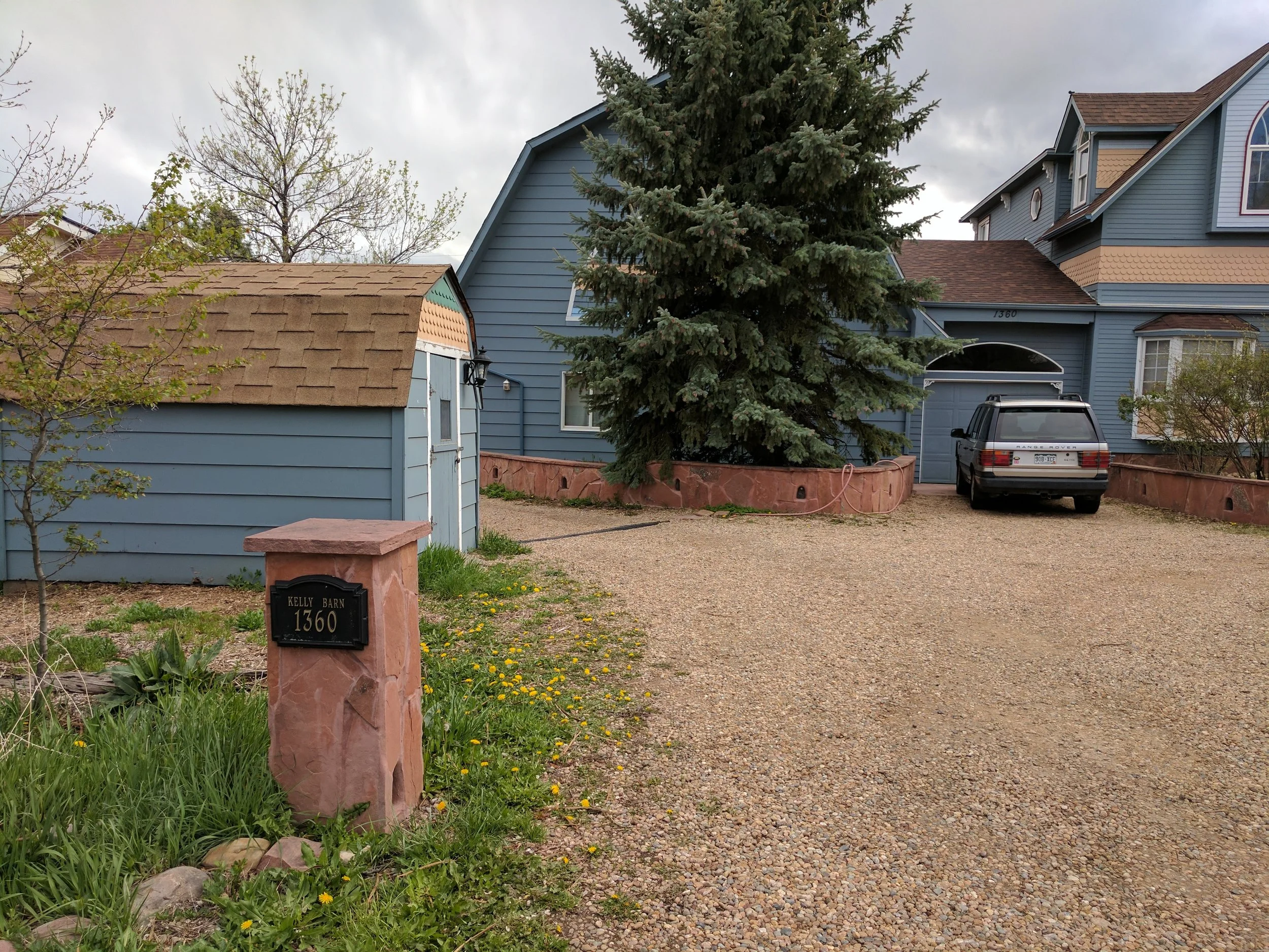 View of the driveway at 1360 Sumac as seen from the street.