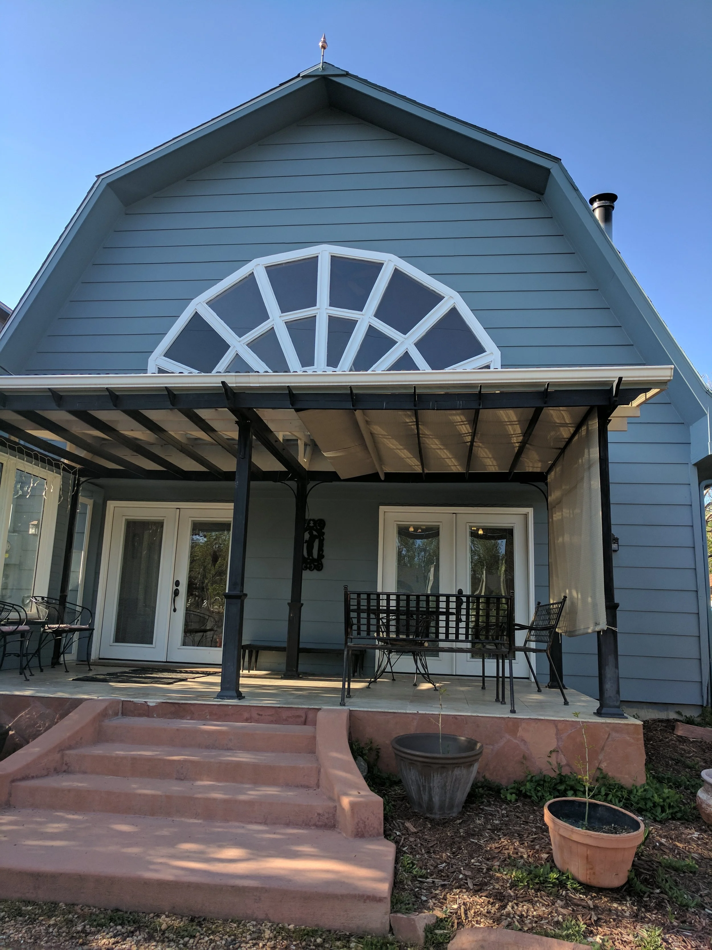Porch entrance as seen from the back after you've come down the driveway.