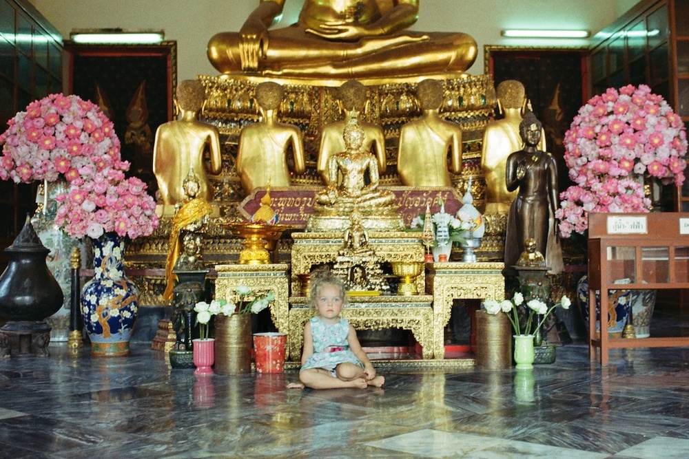 Baby Zhu among Buddhas.jpg
