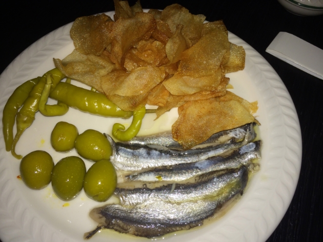 White anchovies. pickled peppers, chips.