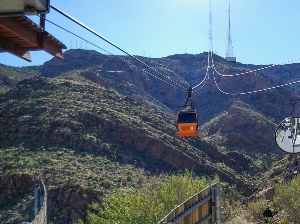 The steel cables pull the Swiss-style Wyler Aerial Tramway cable car 2,600 feet to the mountain’s peak, where a 360-degree observation deck, with restrooms and gift shop, allows for panoramic views over three states and two countries.