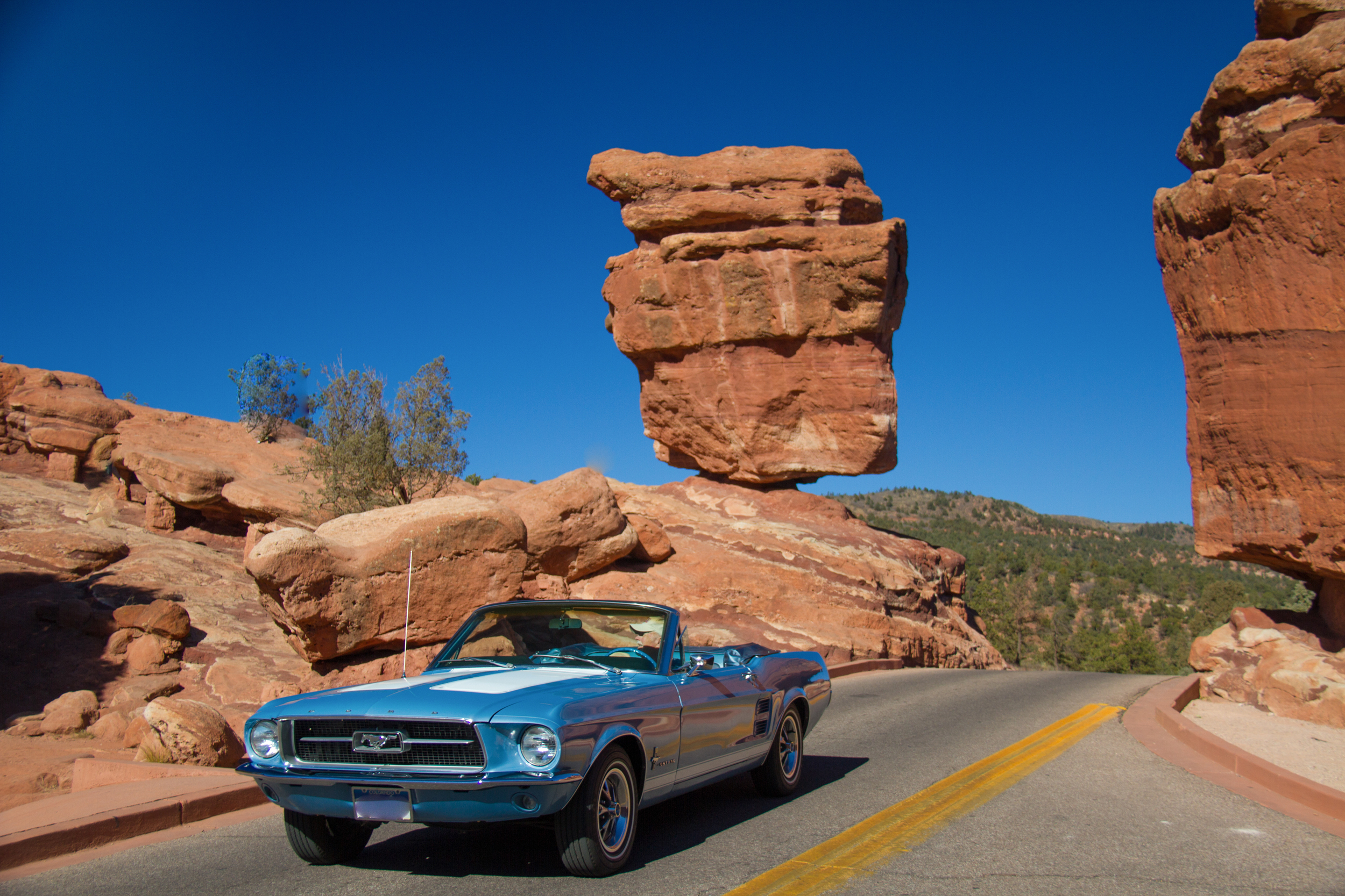 Darn that man and his Mustang... wait, they made the shot better! At Balancing Rock in Garden of the Gods, Colorado Springs, Colorado.