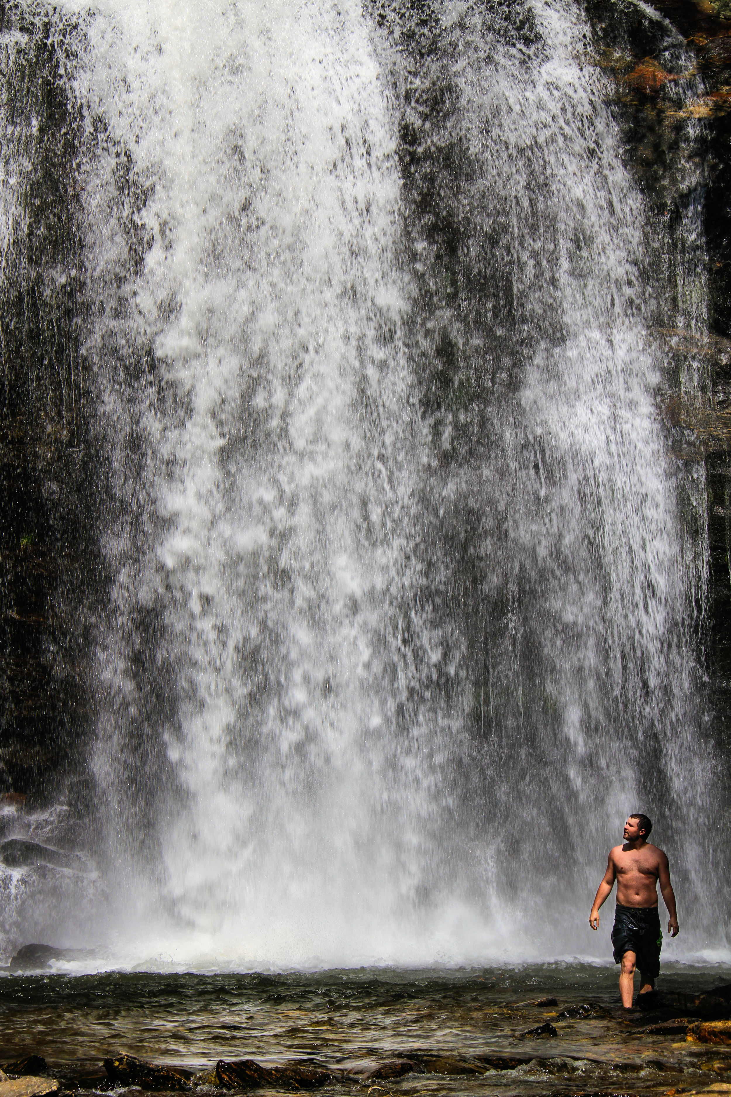 Love how this man gives perspective to the Looking Glass Falls in the Pisgah National Forest..