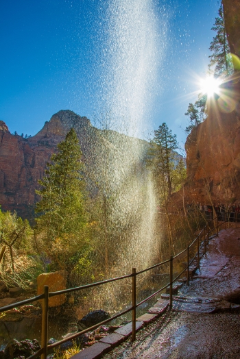 Lower Emerald Falls- as the trailhead begins, visitors are treated to a pathway underneath the falls as it trickles down overhead. 