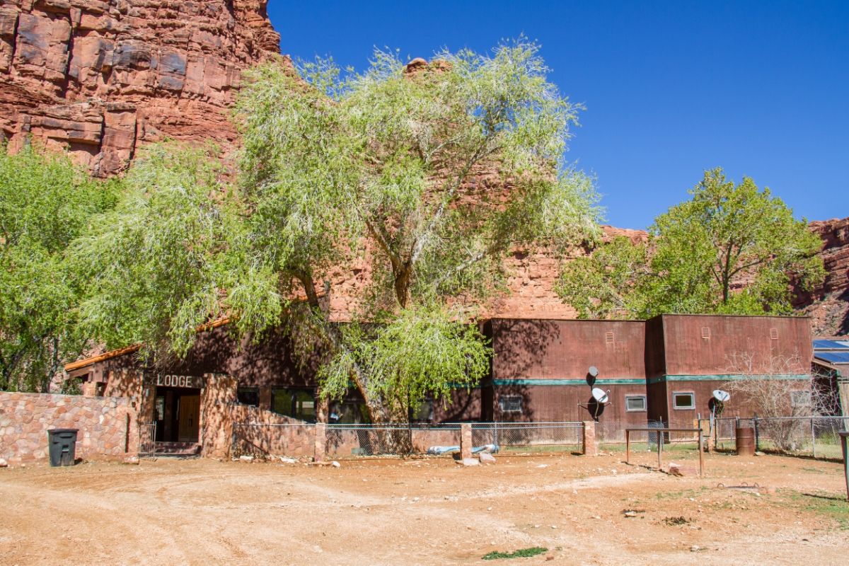Supai Lodge is nestled in the corner of the canyon. I recommend a nomination to " Hotel IMpossible " but it's an air conditioned place to sleep and shower in close proximity to the Cafe' and General STore. Don't panic if the clerk isn't there and the place is locked up before 5pm. The clerk randomly takes off to lolly-gag or get a snack. But she will be back! I recommend being at the lobby by 4:30 to ensure you can check into your room. Oh, at night watch for roaming dogs. Yes, I'm serious. 