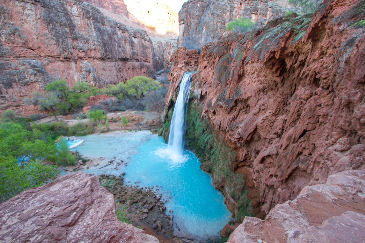 Pay Dirt! This is what you've come to see! The first glimpse of Havasu Falls is from this vantage point. The trail leads sharply downhill and entrances to the base of the falls will be on the right. 