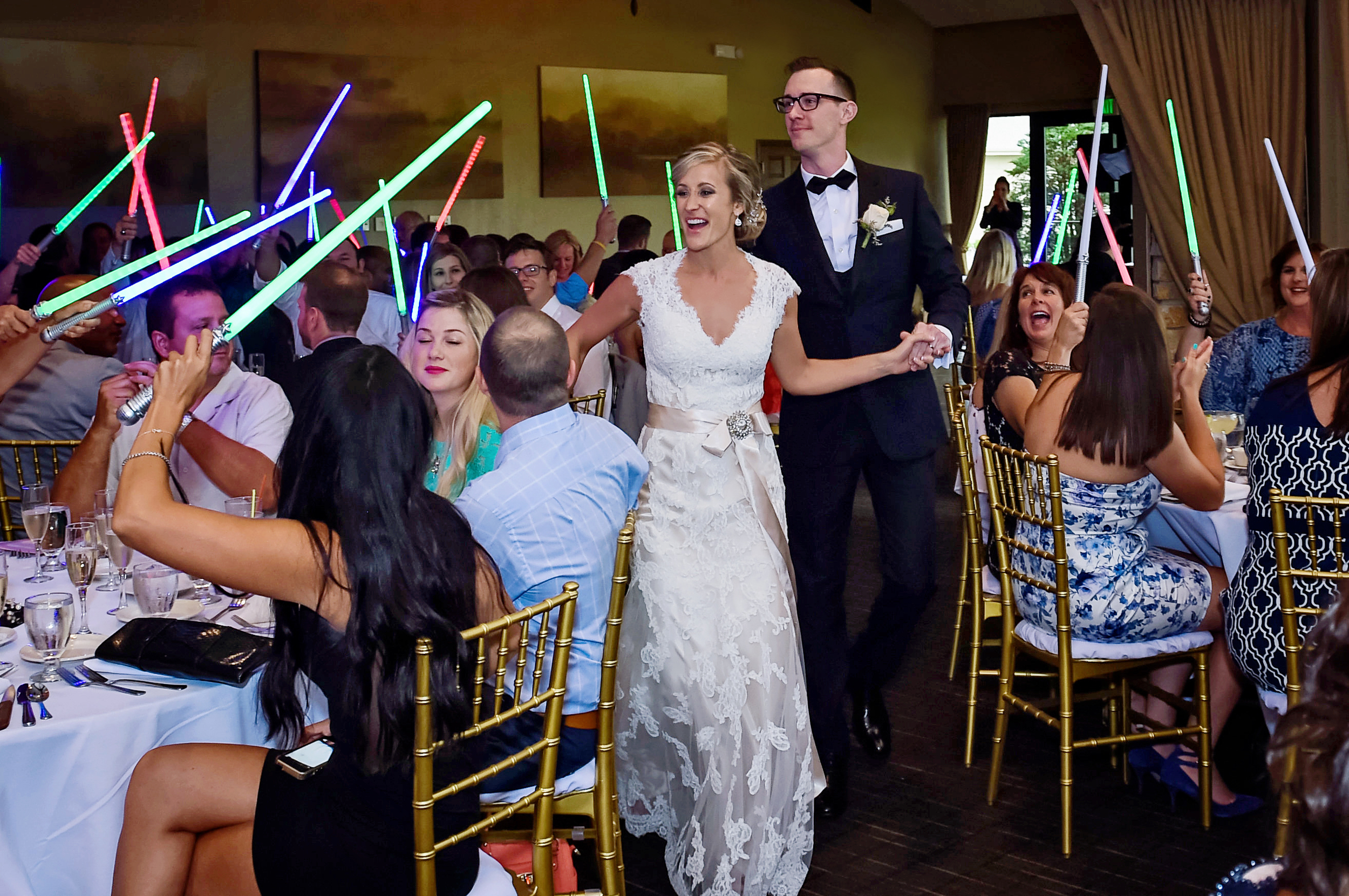  Adam and Erica made their entrance as Mr. & Mrs. to a Jedi worthy salute.