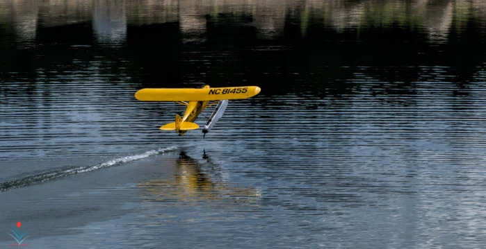 Piper Cub Floatplane Breaking Free.jpg
