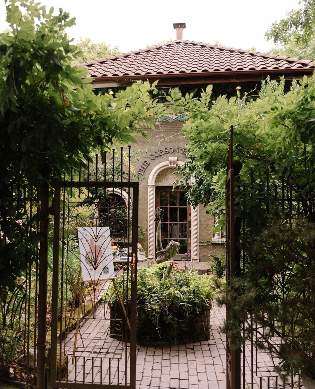 The Corson Building is a historic 1920's-era space that was transformed from a residential home into a renowned restaurant and event venue in 2008. Its rustic, romantic European-style charm, ivy-covered brick, family style dining, lush gardens, incre