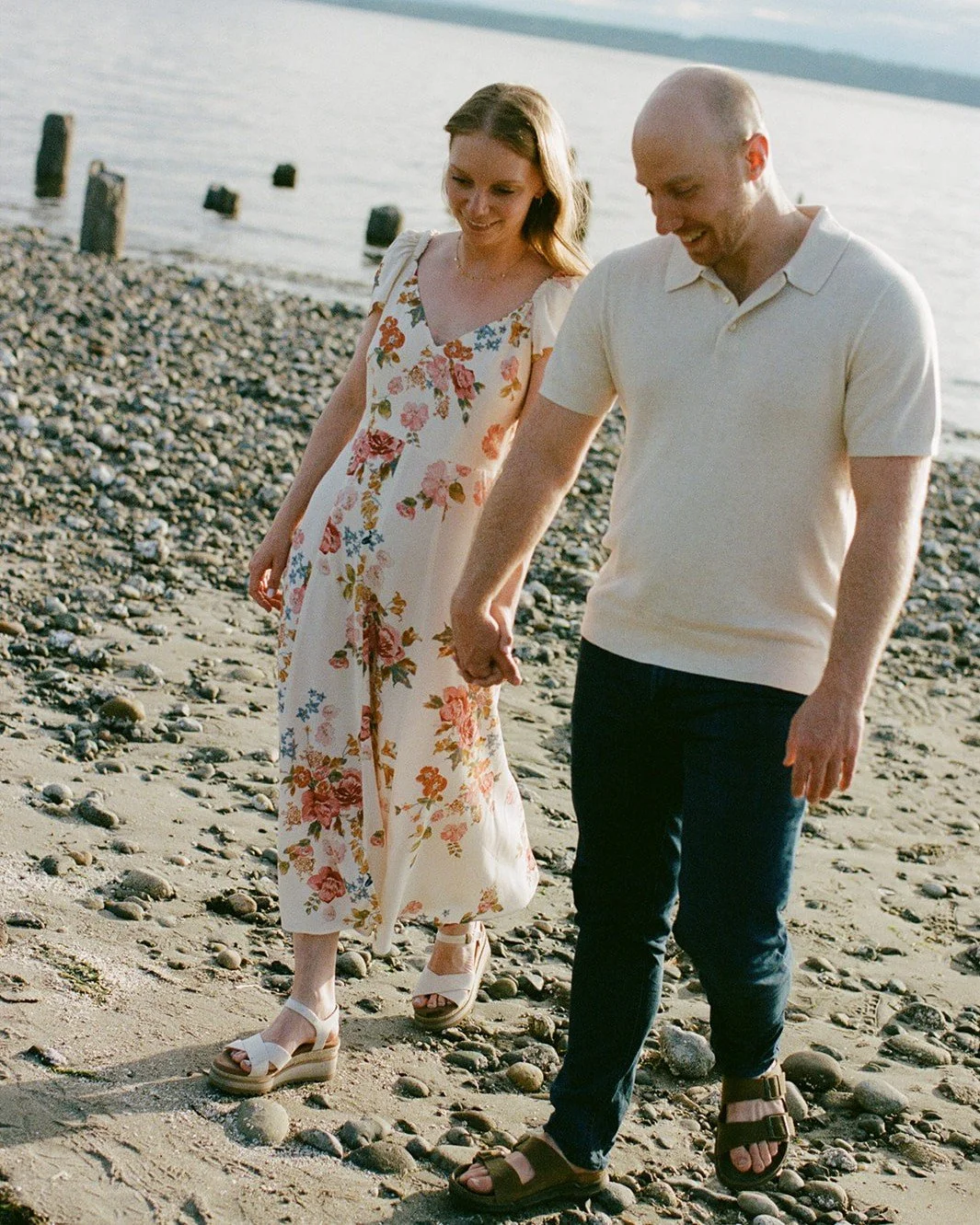 Golden Gardens park is a special Seattle location for Katy and Russ so naturally, we used it as the backdrop for their engagement photos. Seattle was showing off that evening, and the golden hour light kissed their cheeks as they became lost in each 