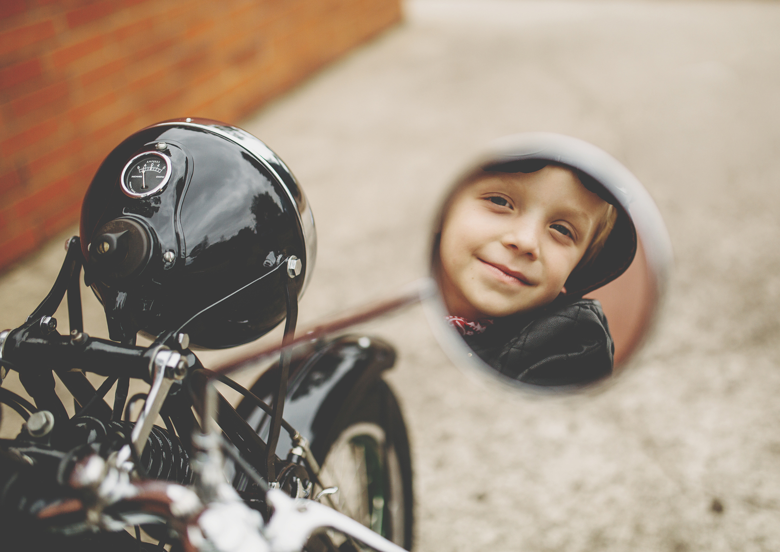 Reflection of a child in the rear view mirror!