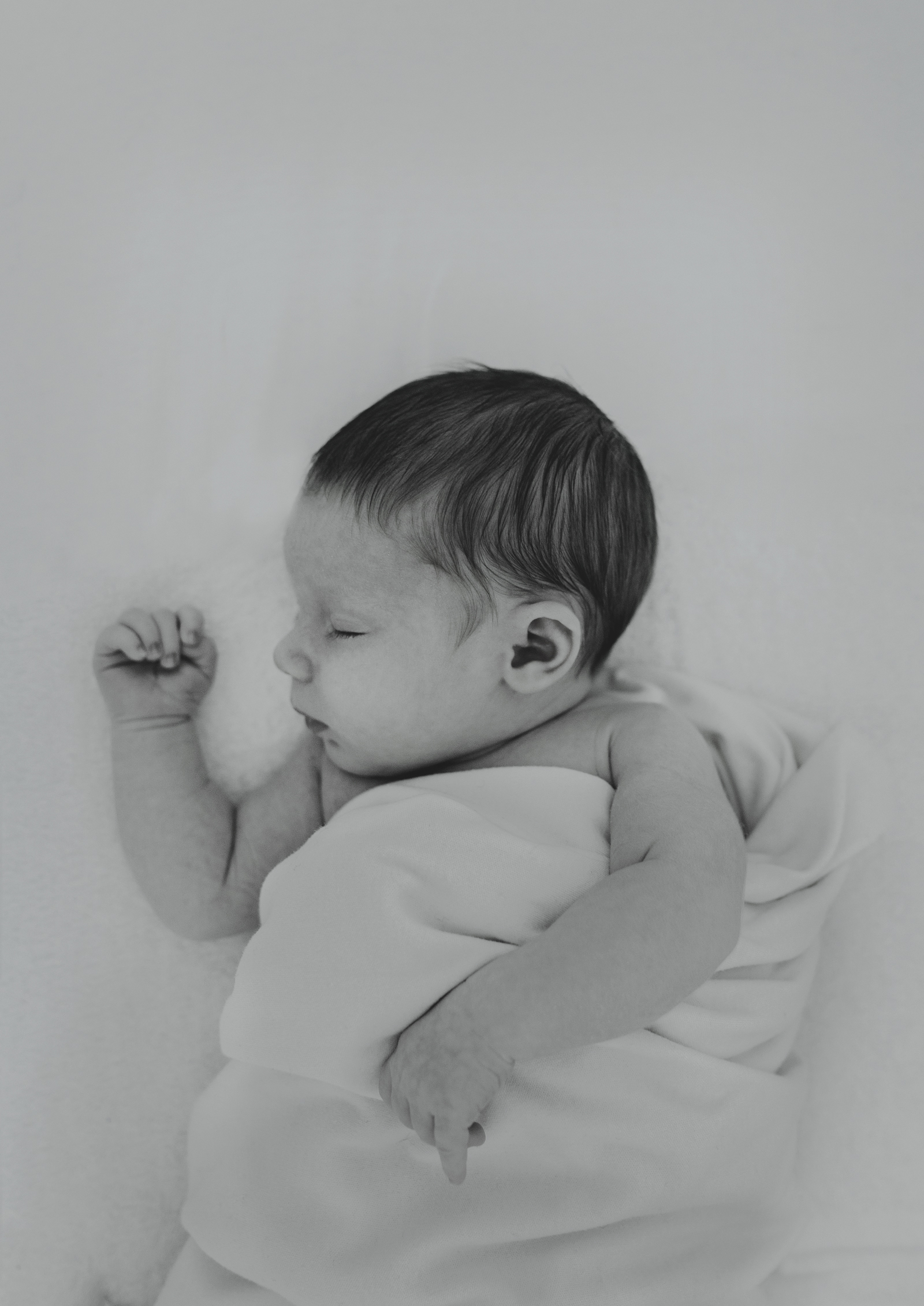 Sleeping newborn baby girl