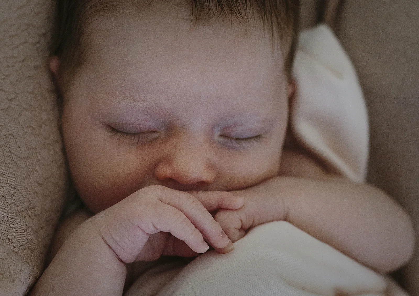 Newborn baby girl's tiny hands