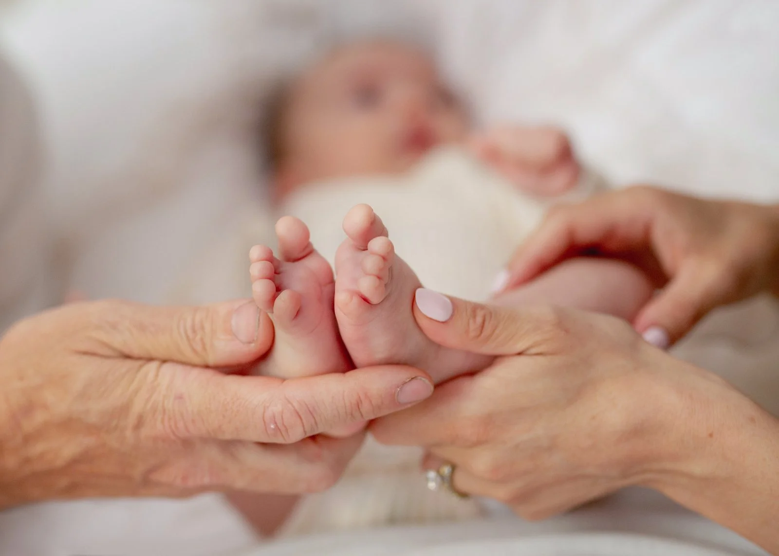 Baby boy's tiny feet