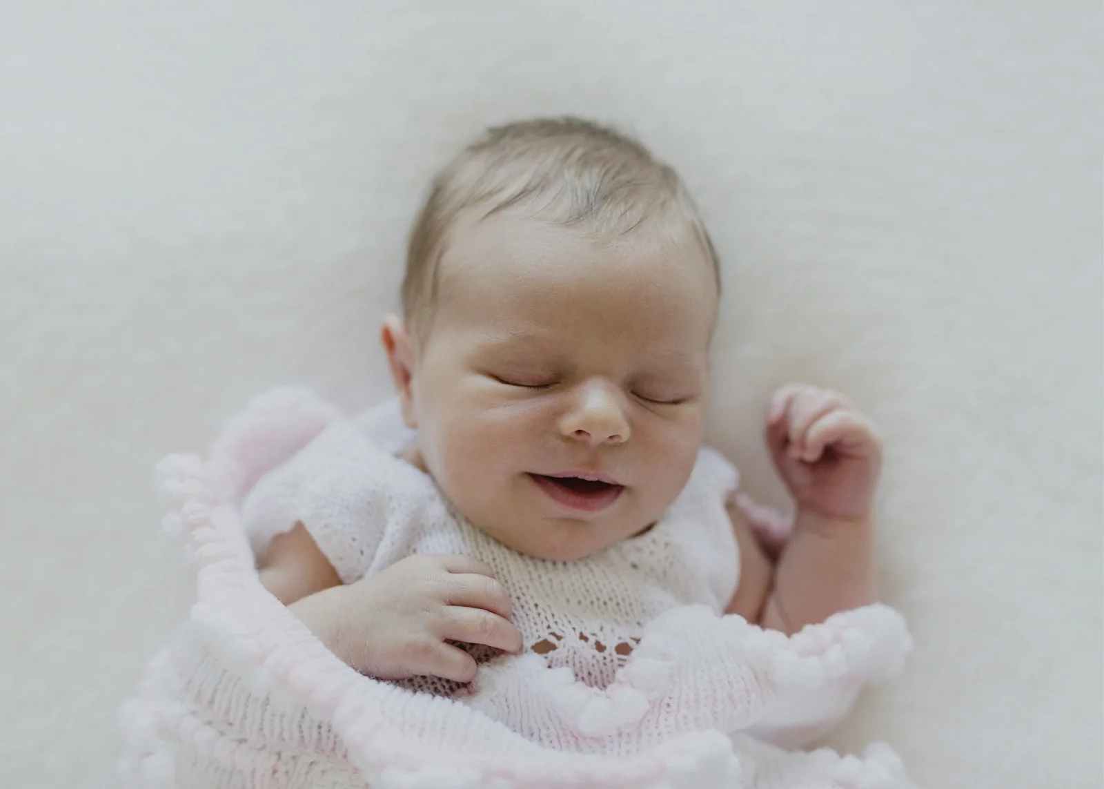 Smiling Newborn Baby Girl